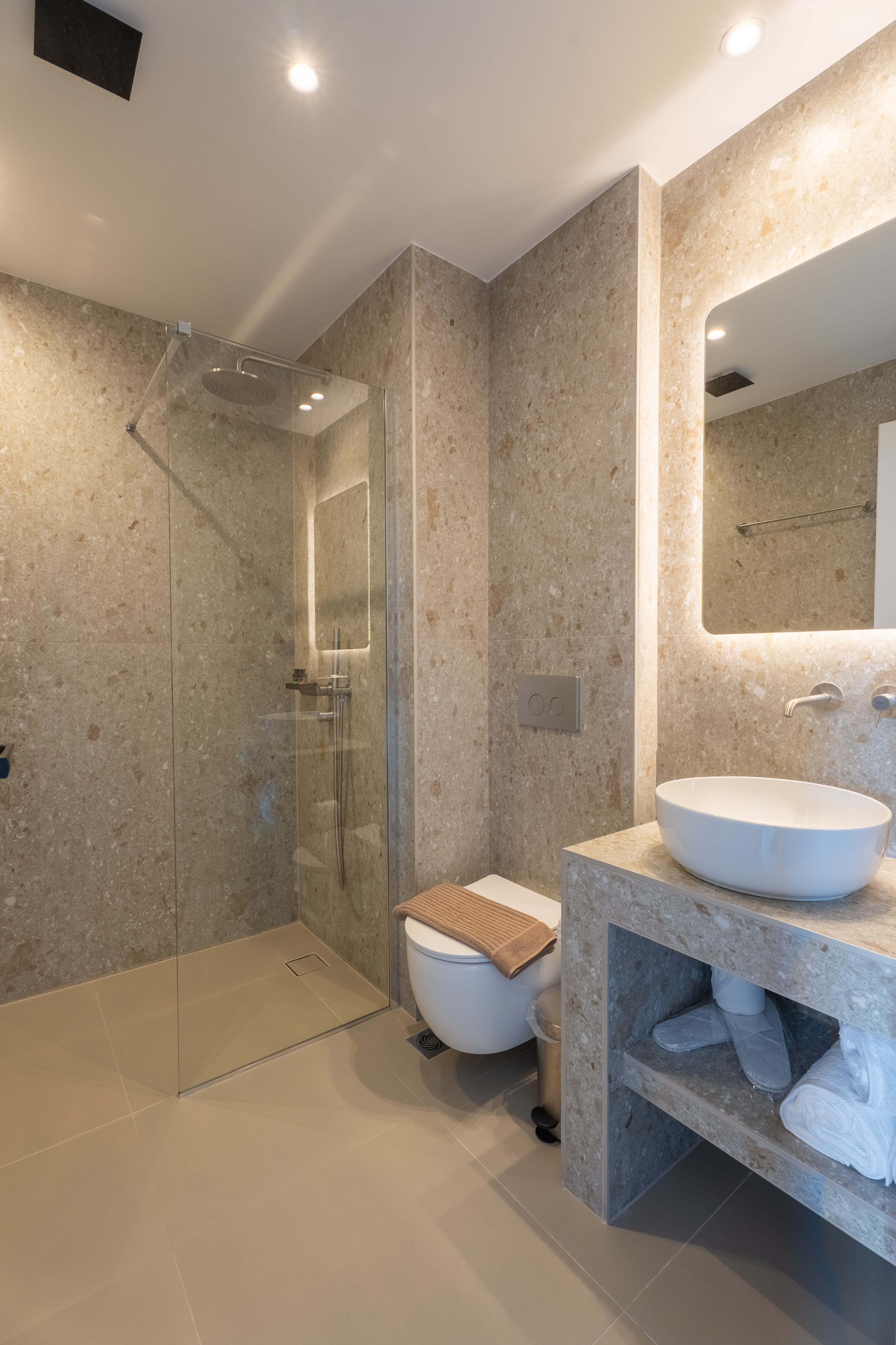 a bathroom with a glass shower