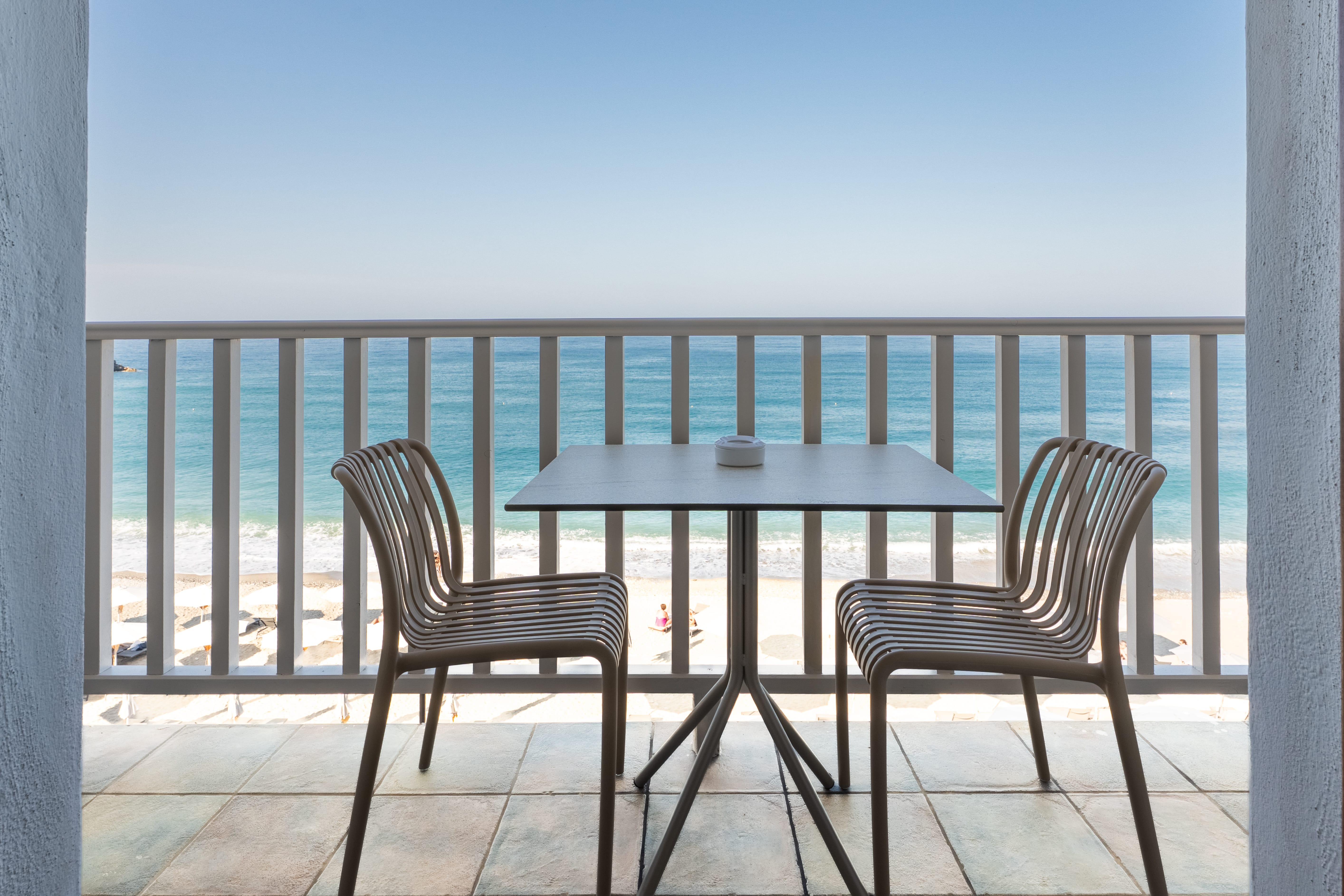 a table and chairs on a deck