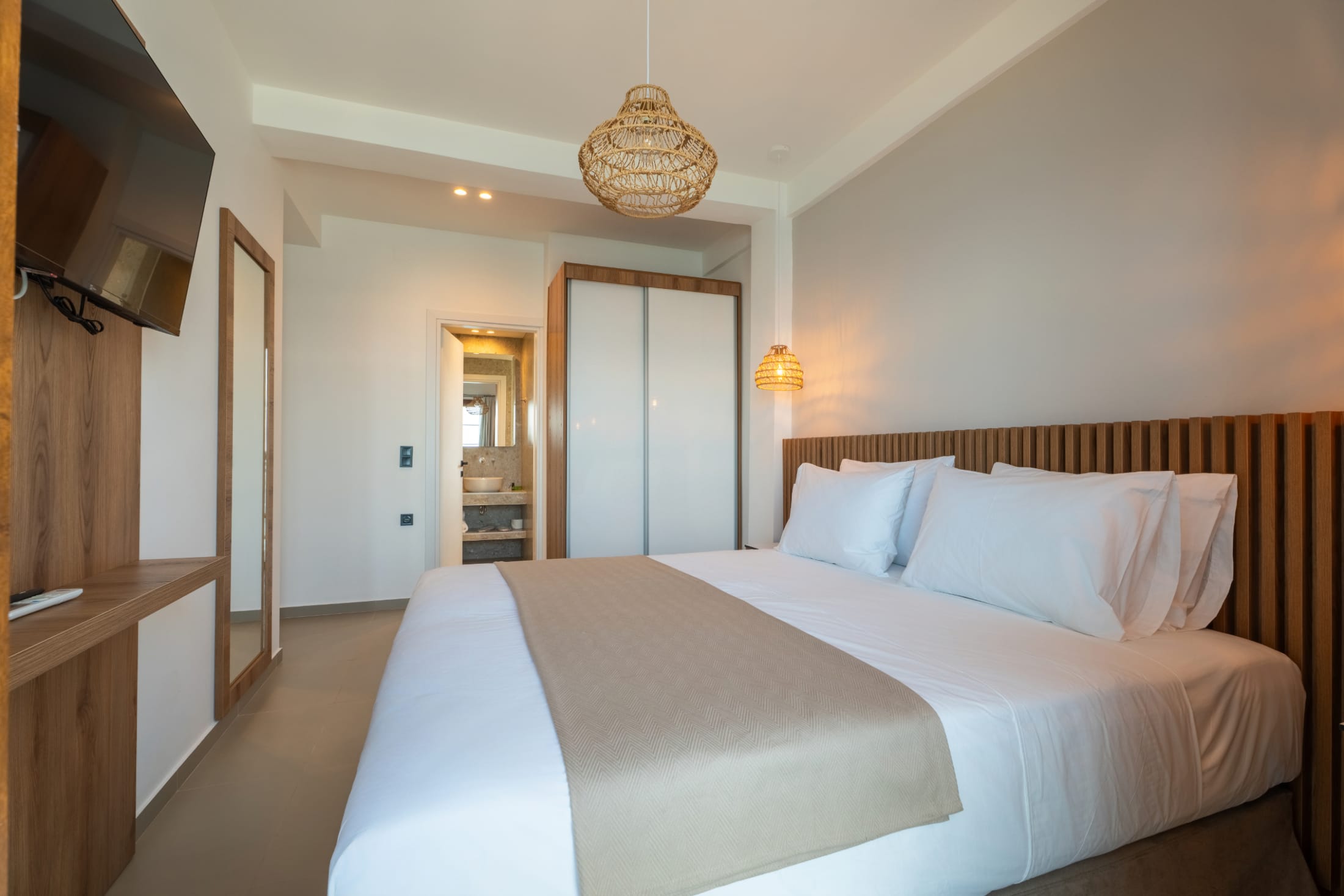 a hotel room with two beds