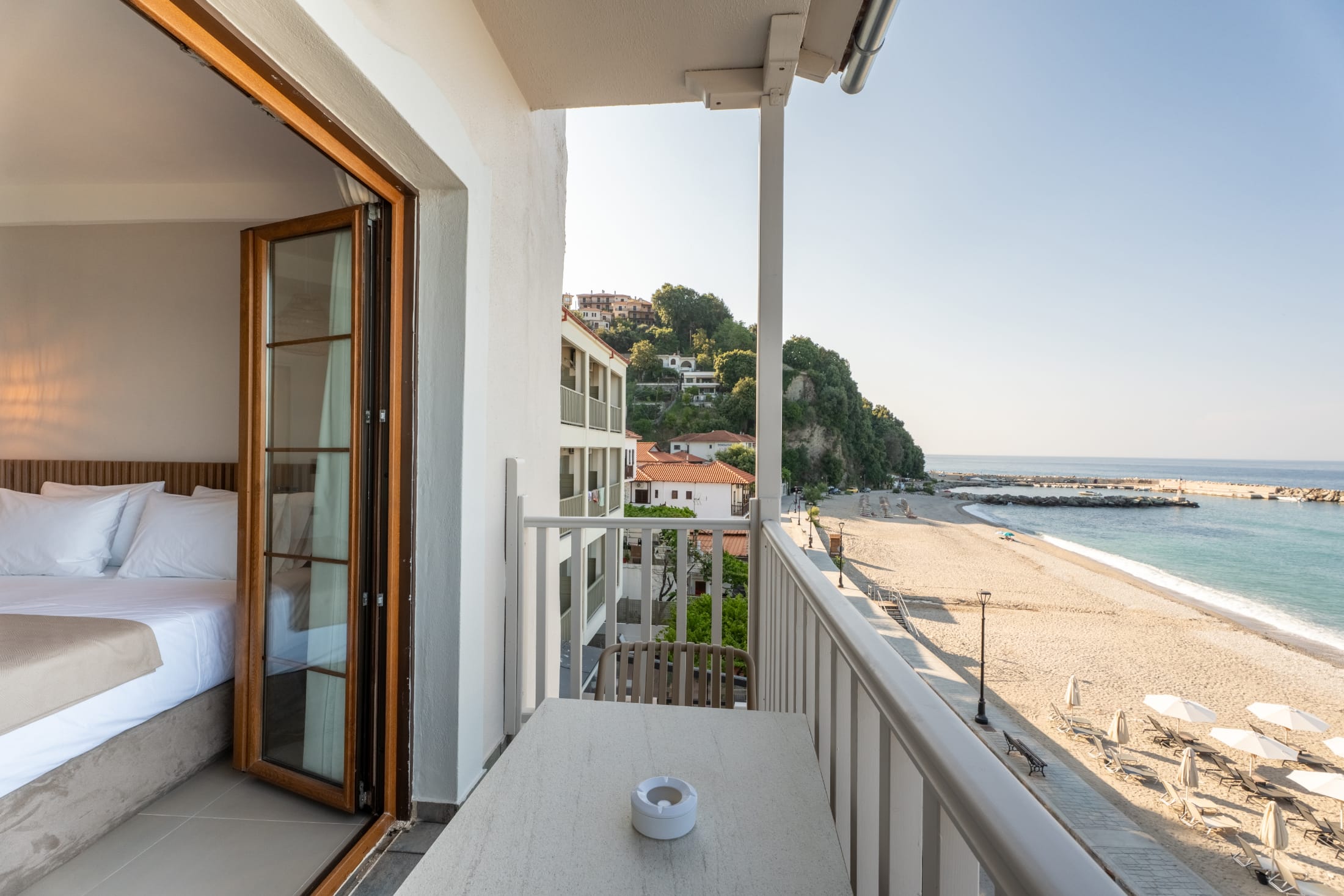 a balcony overlooking a beach