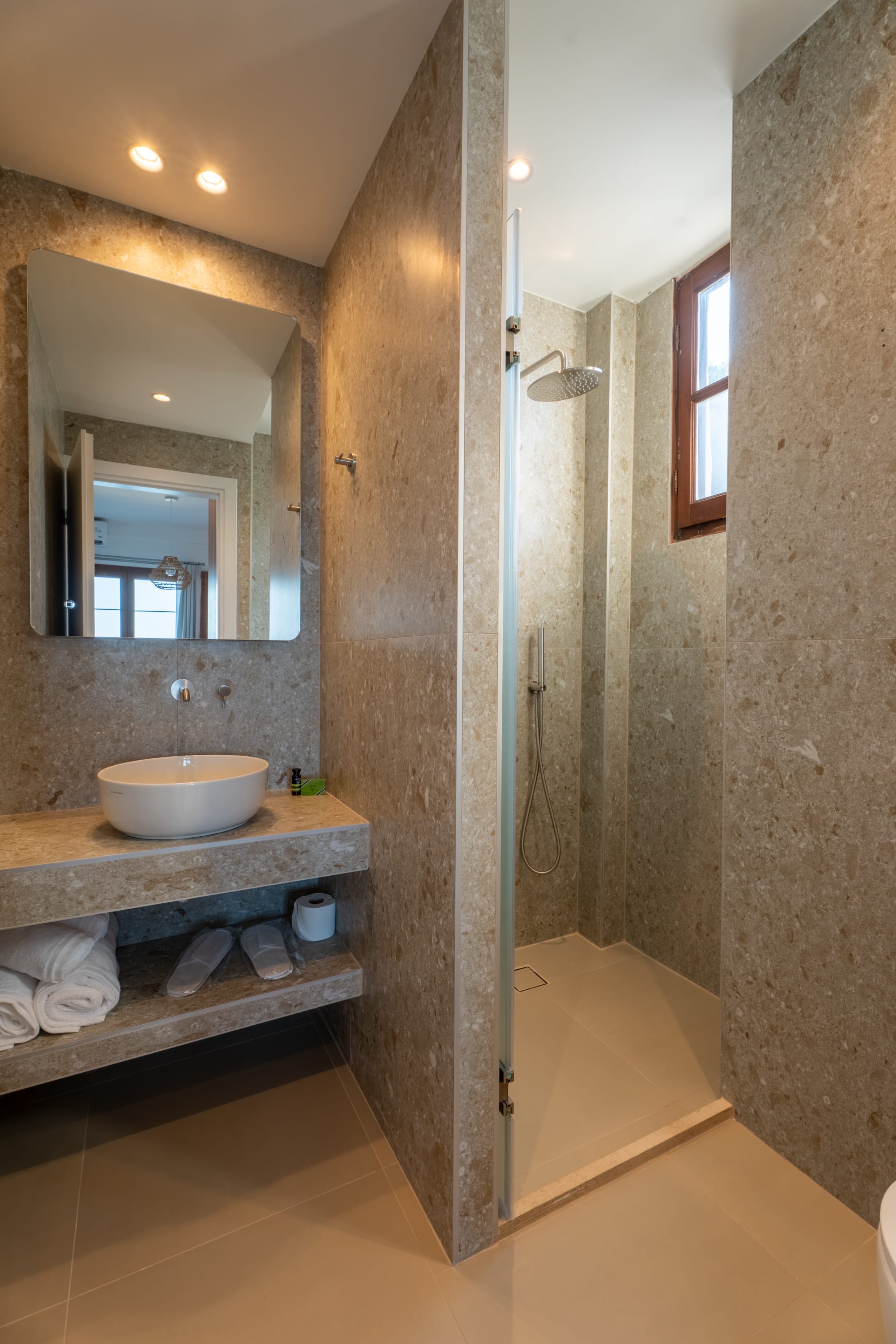 a bathroom with a glass shower