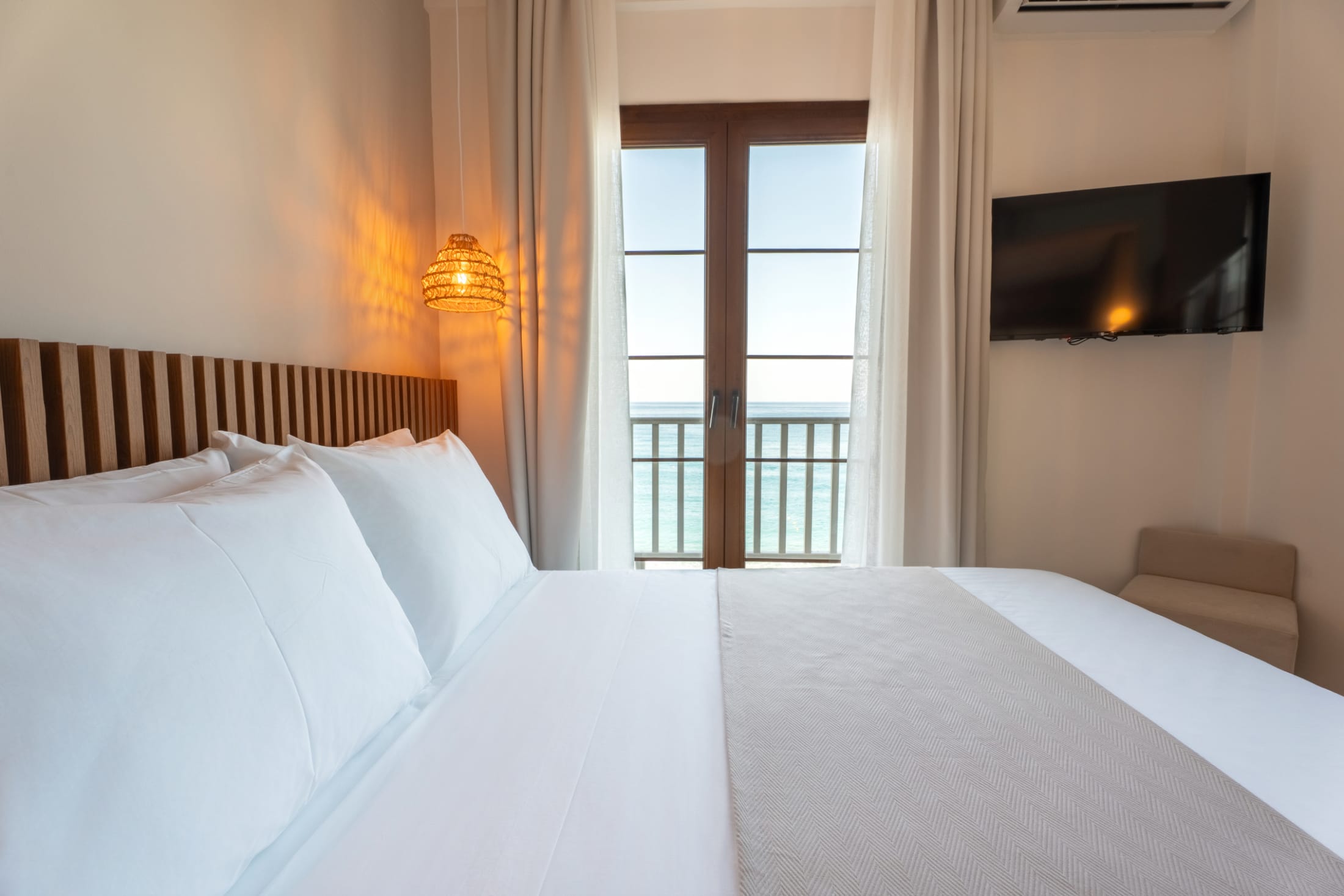 a couple of beds in a hotel room