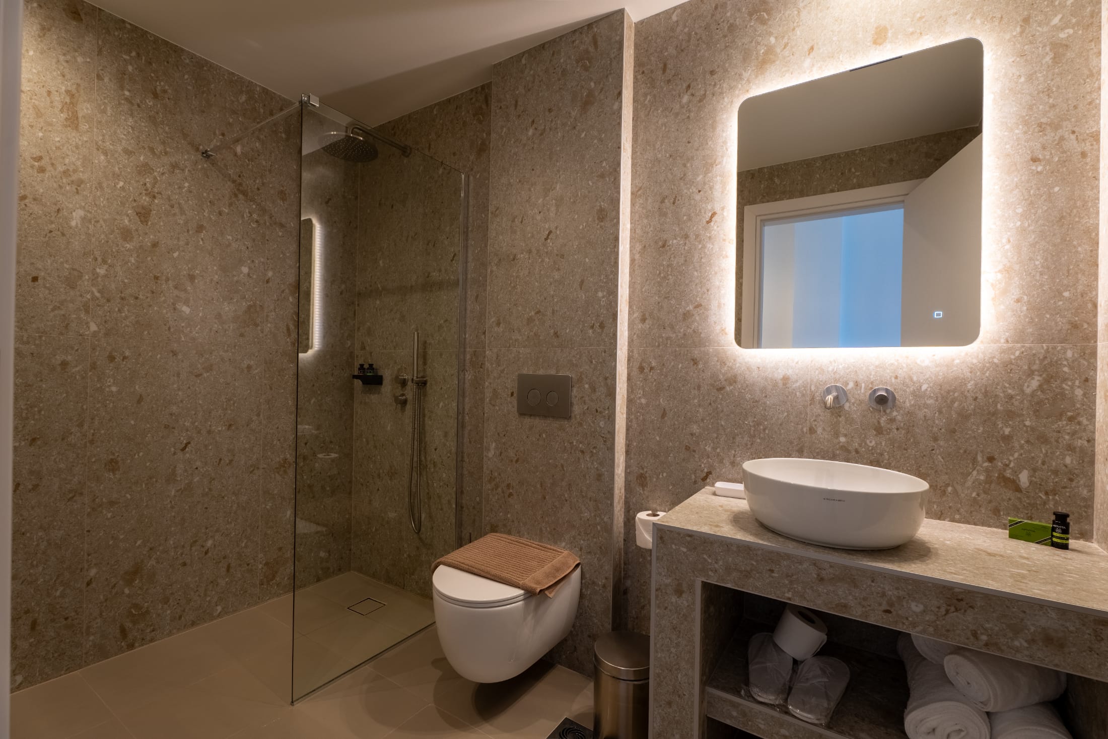 a bathroom with a sink and toilet