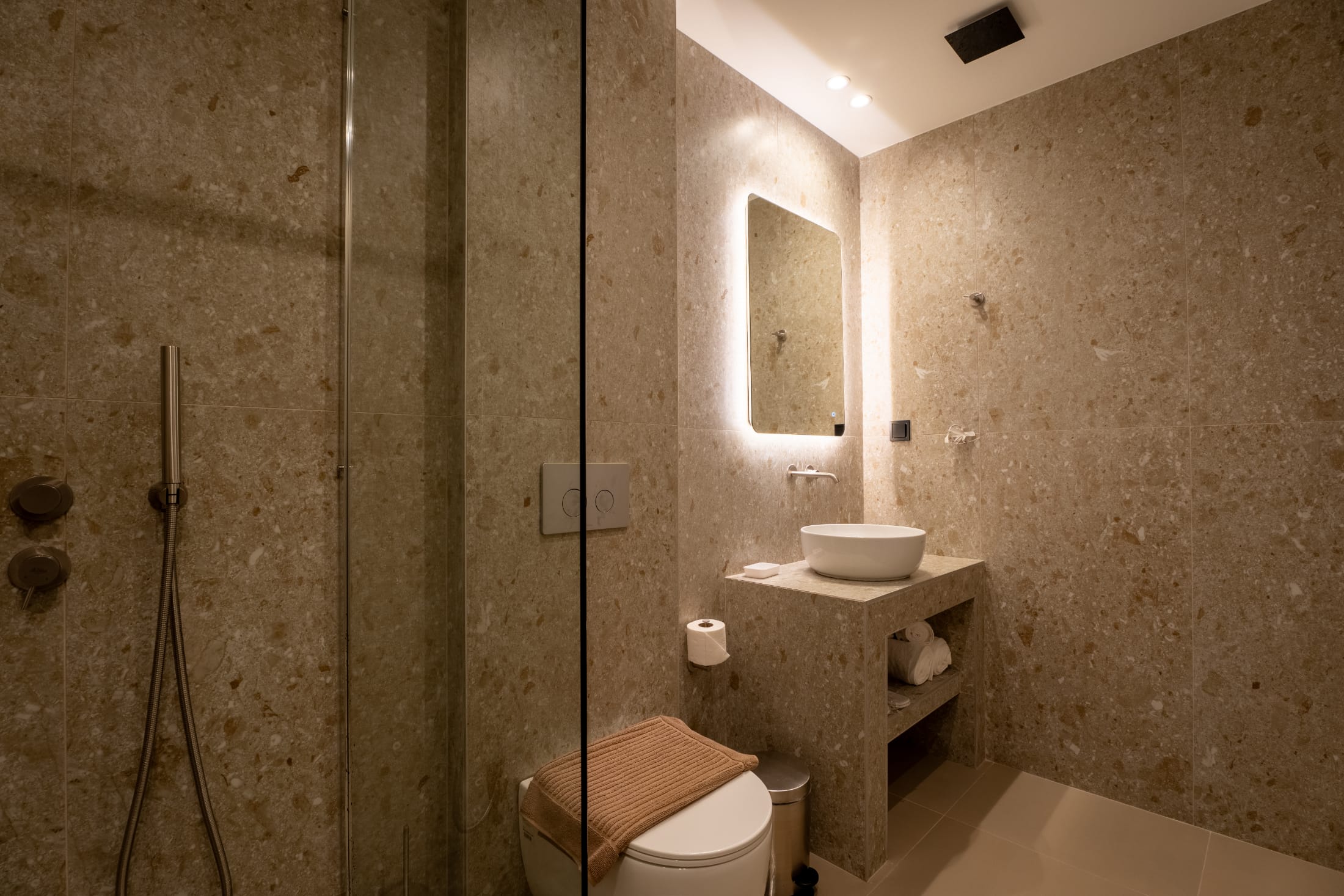 a bathroom with a sink toilet and bathtub
