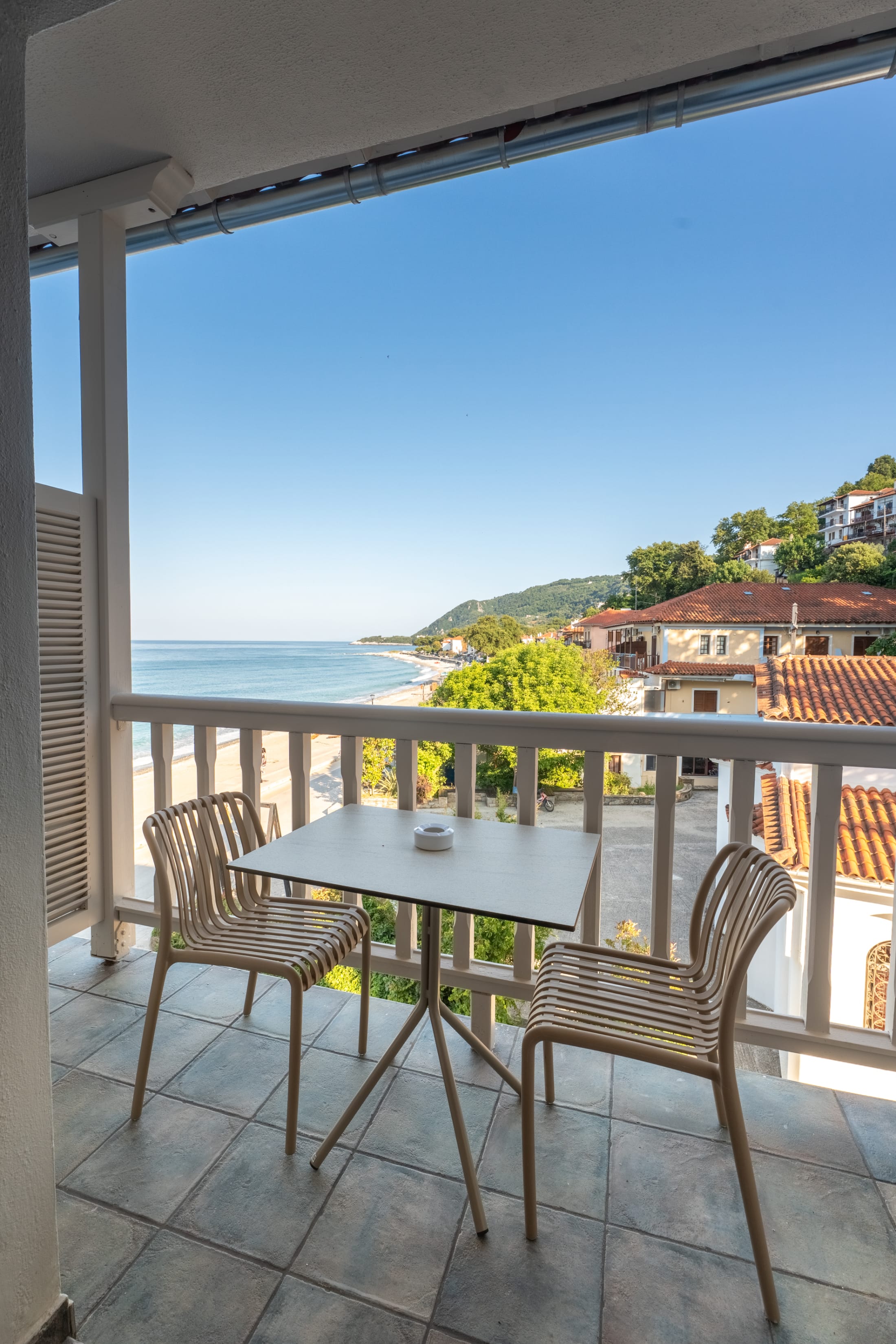a table and chairs on a deck