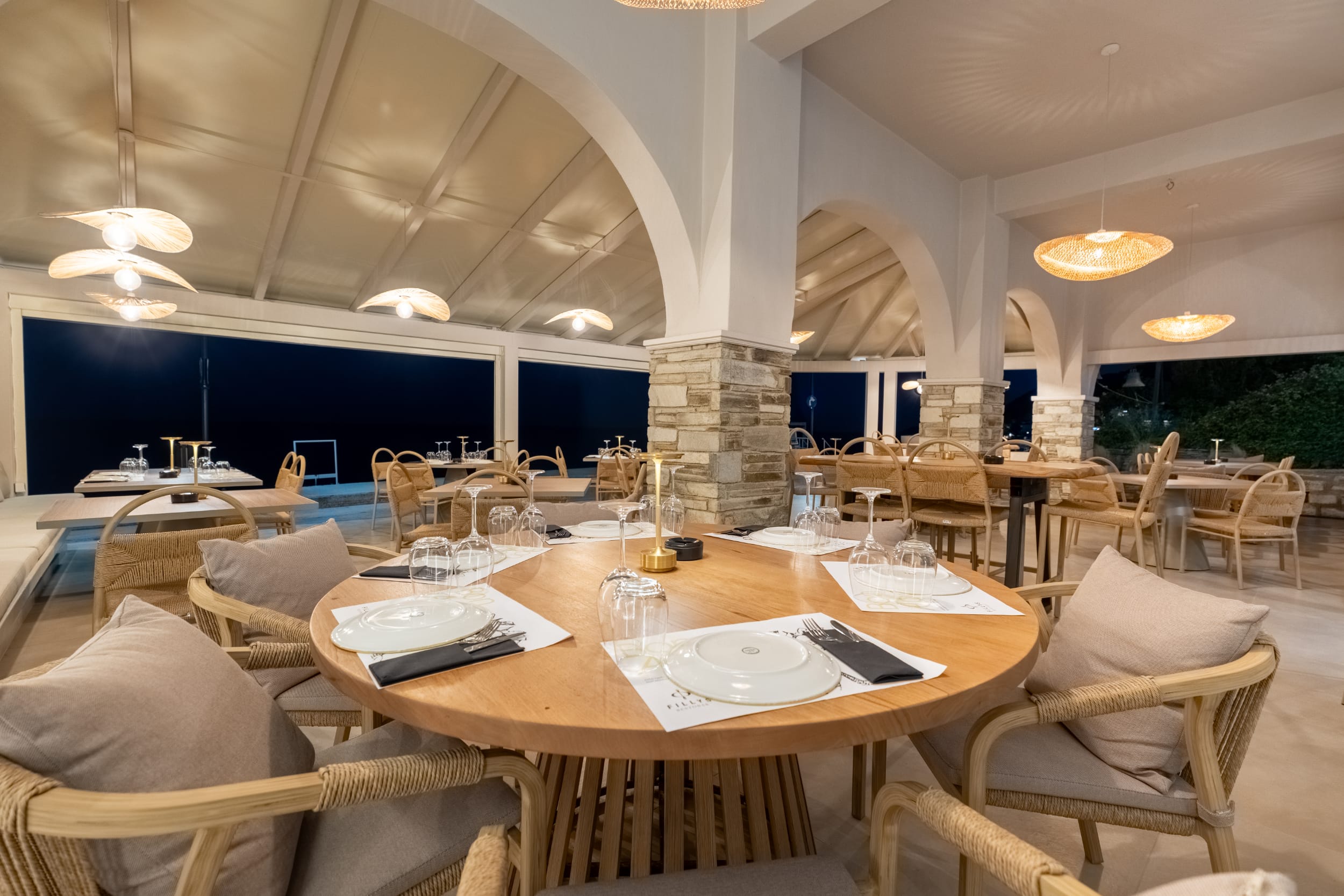 a restaurant with tables and chairs