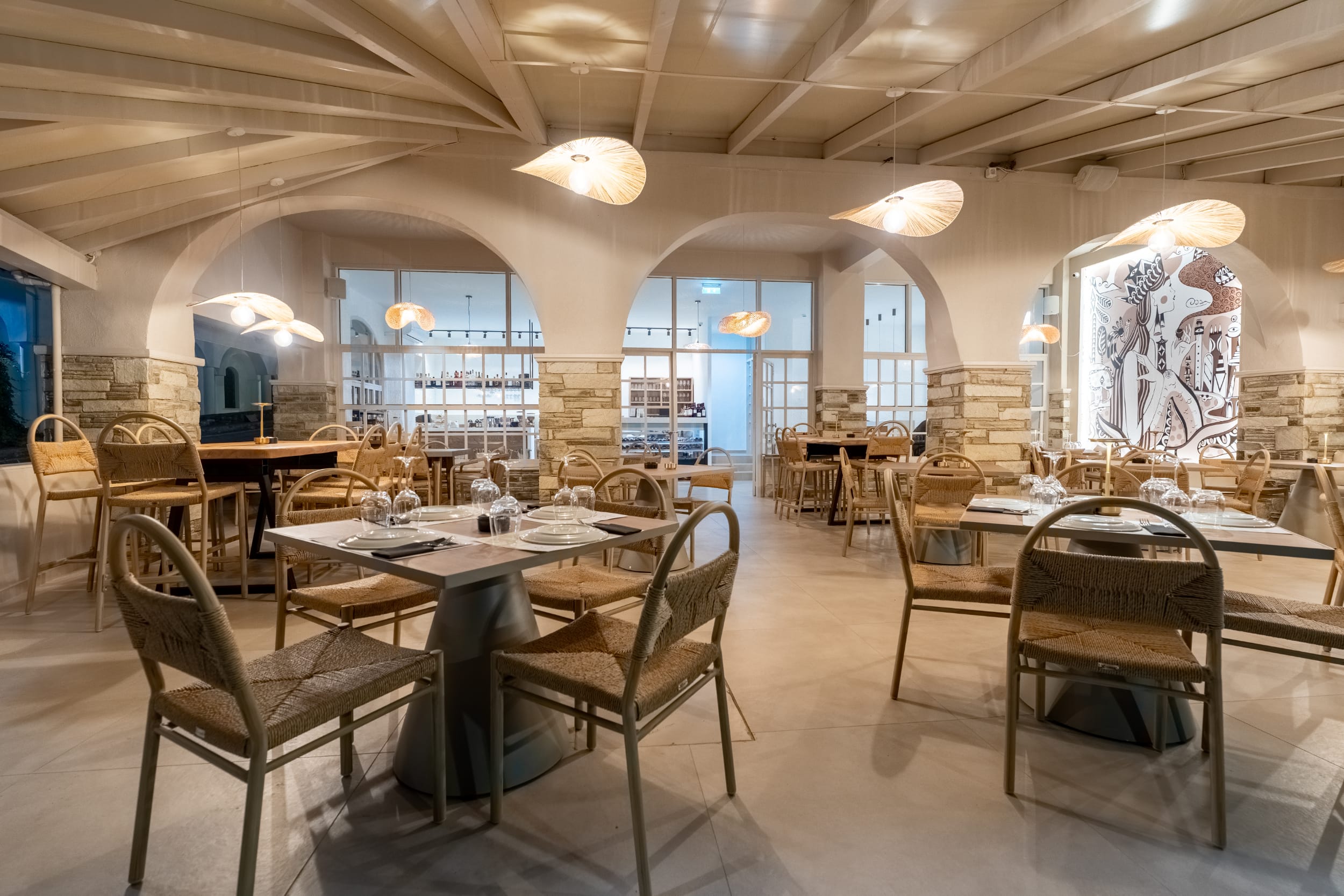 a room with tables and chairs