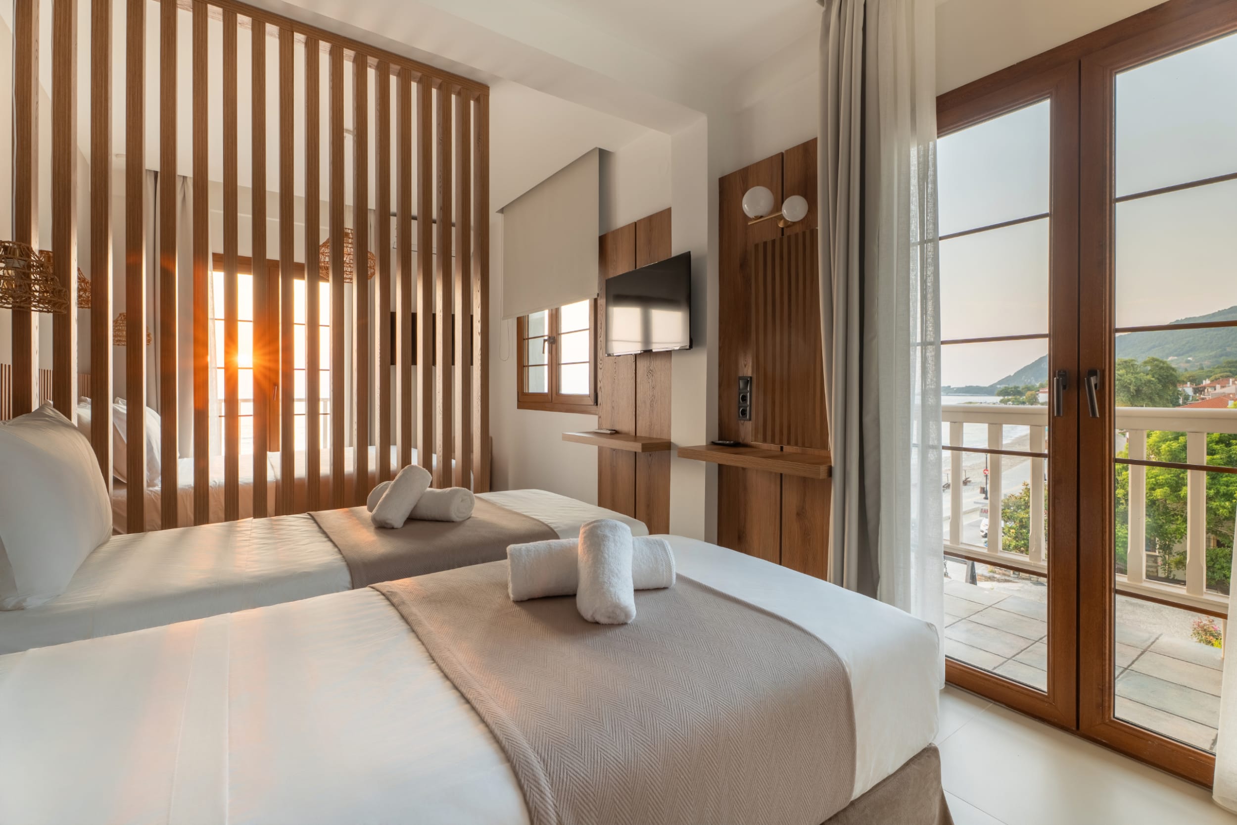 a bedroom with a large window