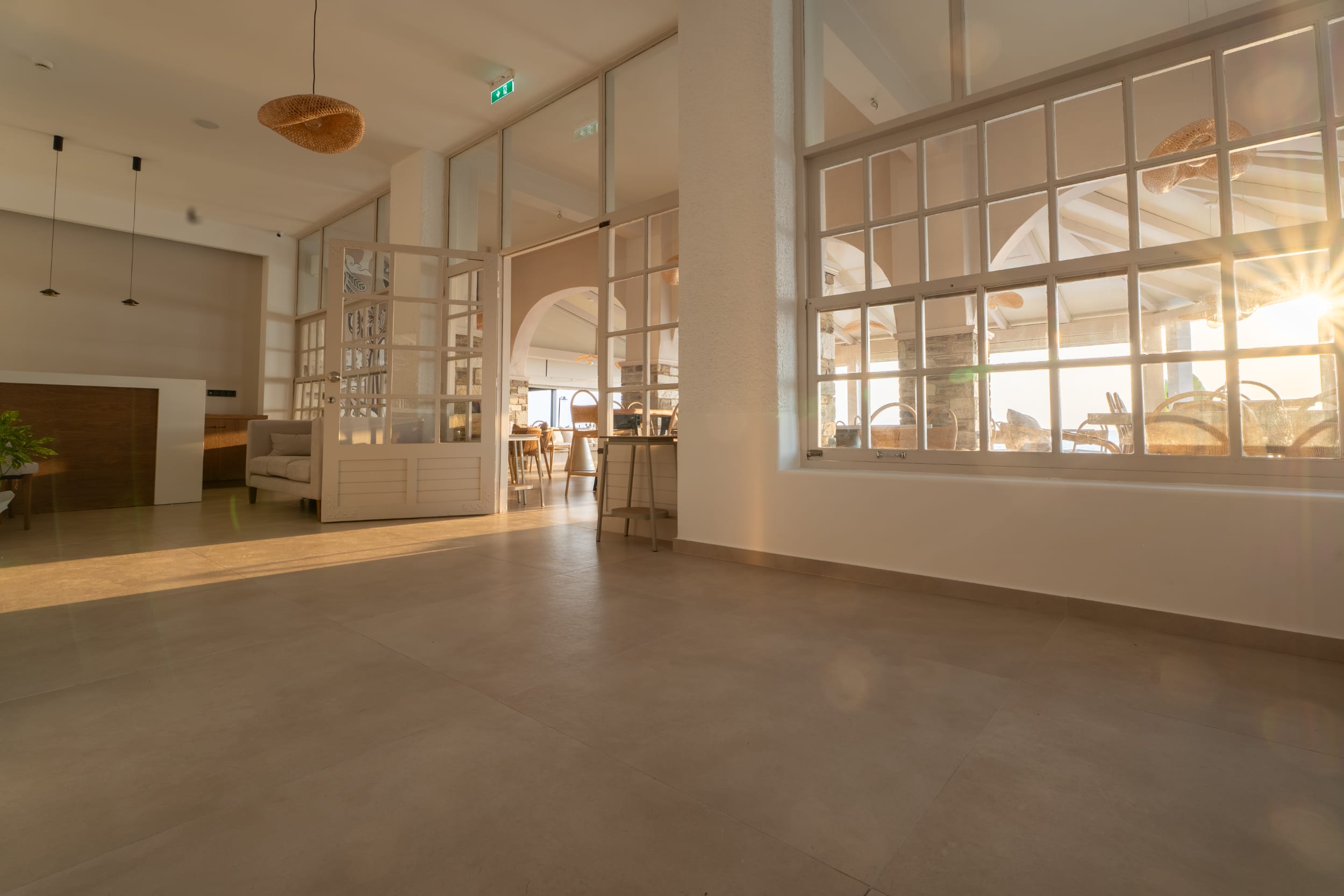 a large empty room with a large window