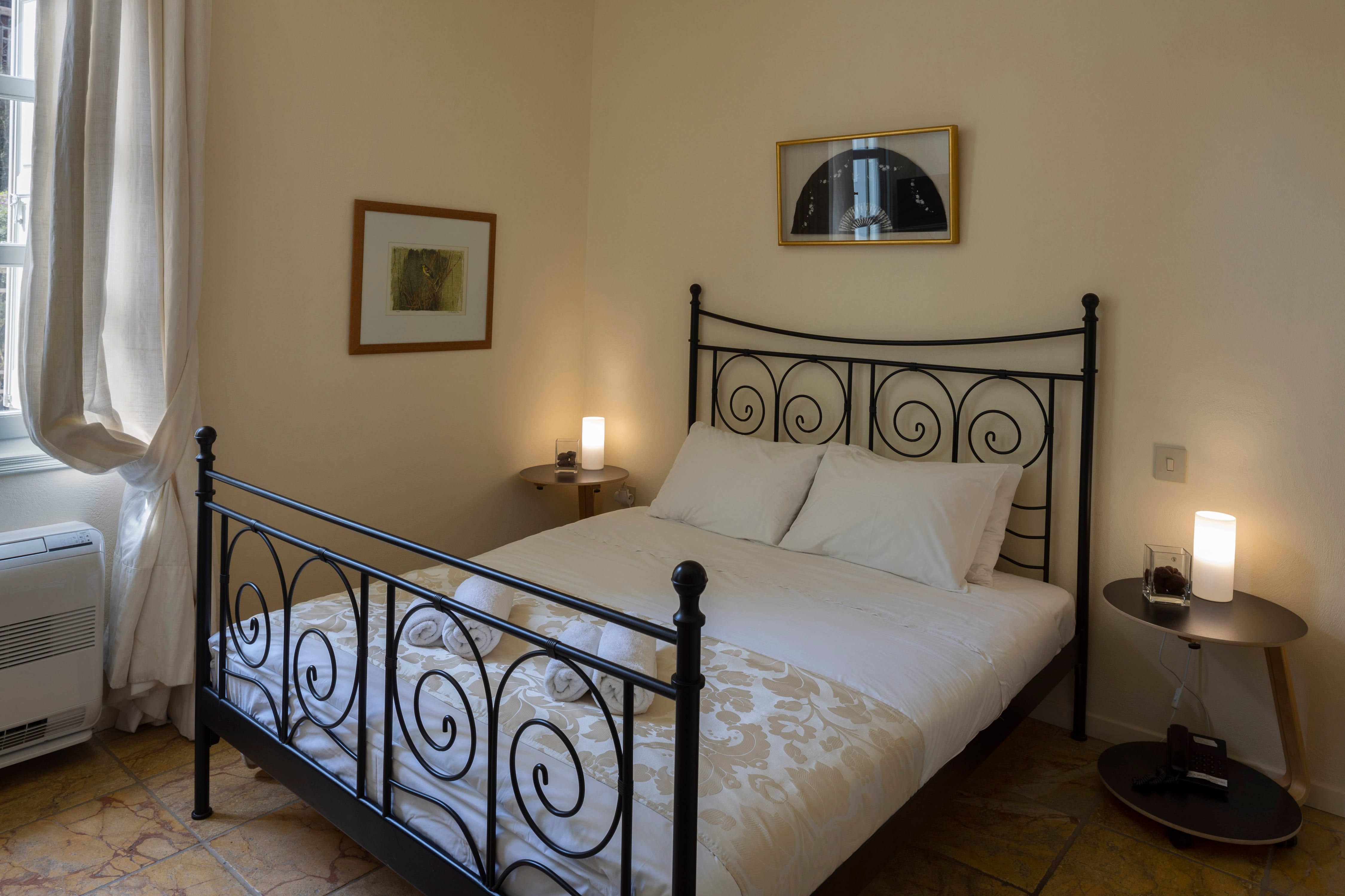 a bed with white sheets