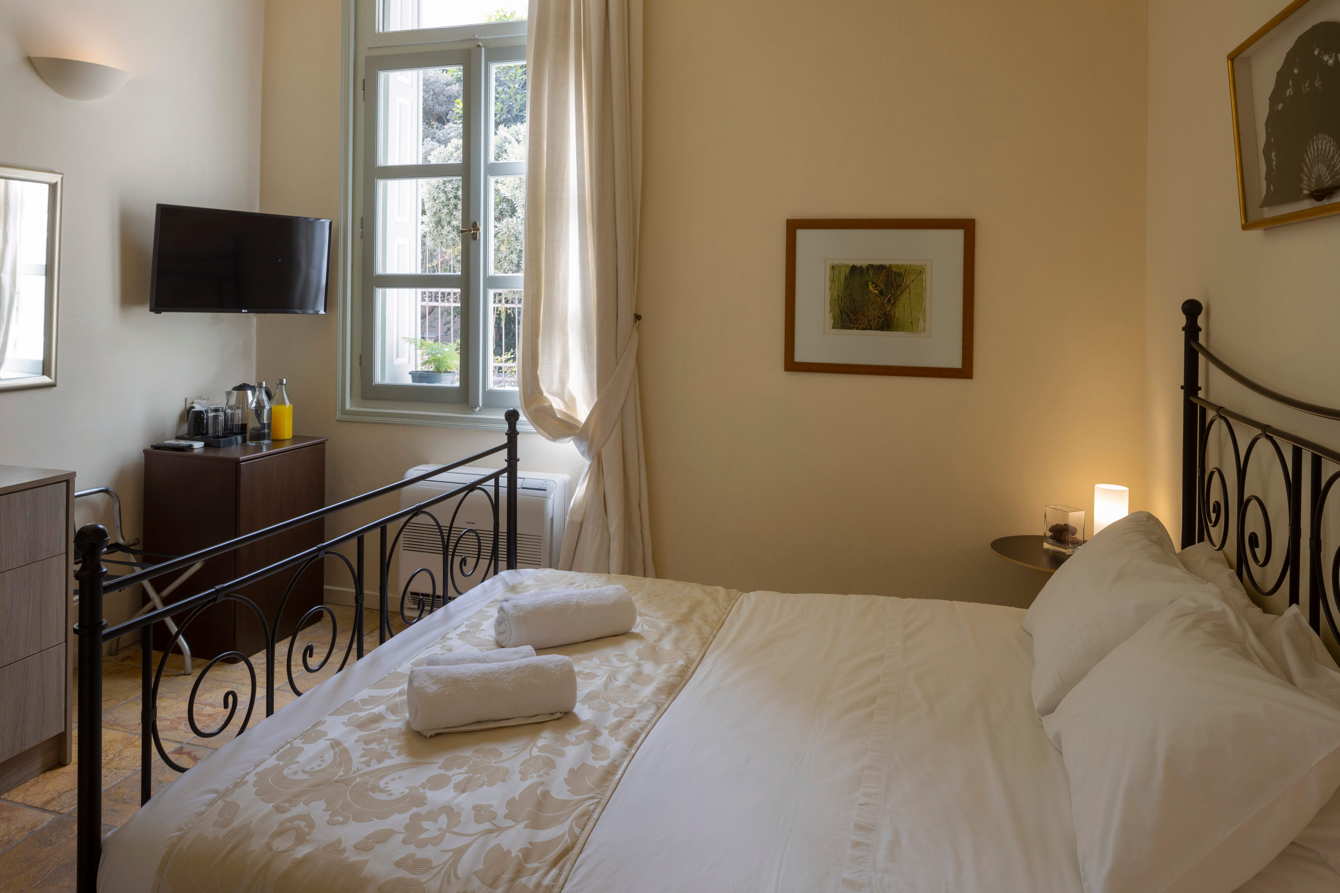 a bed with white sheets