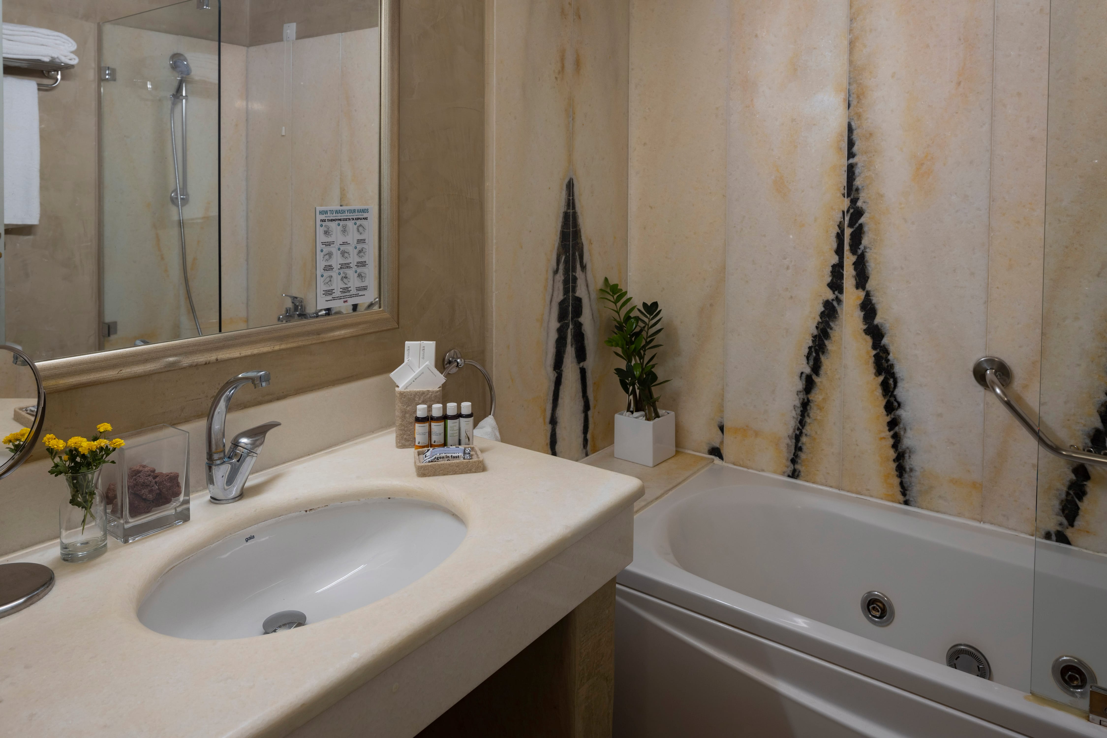 a bathroom with a tub sink and a bathtub