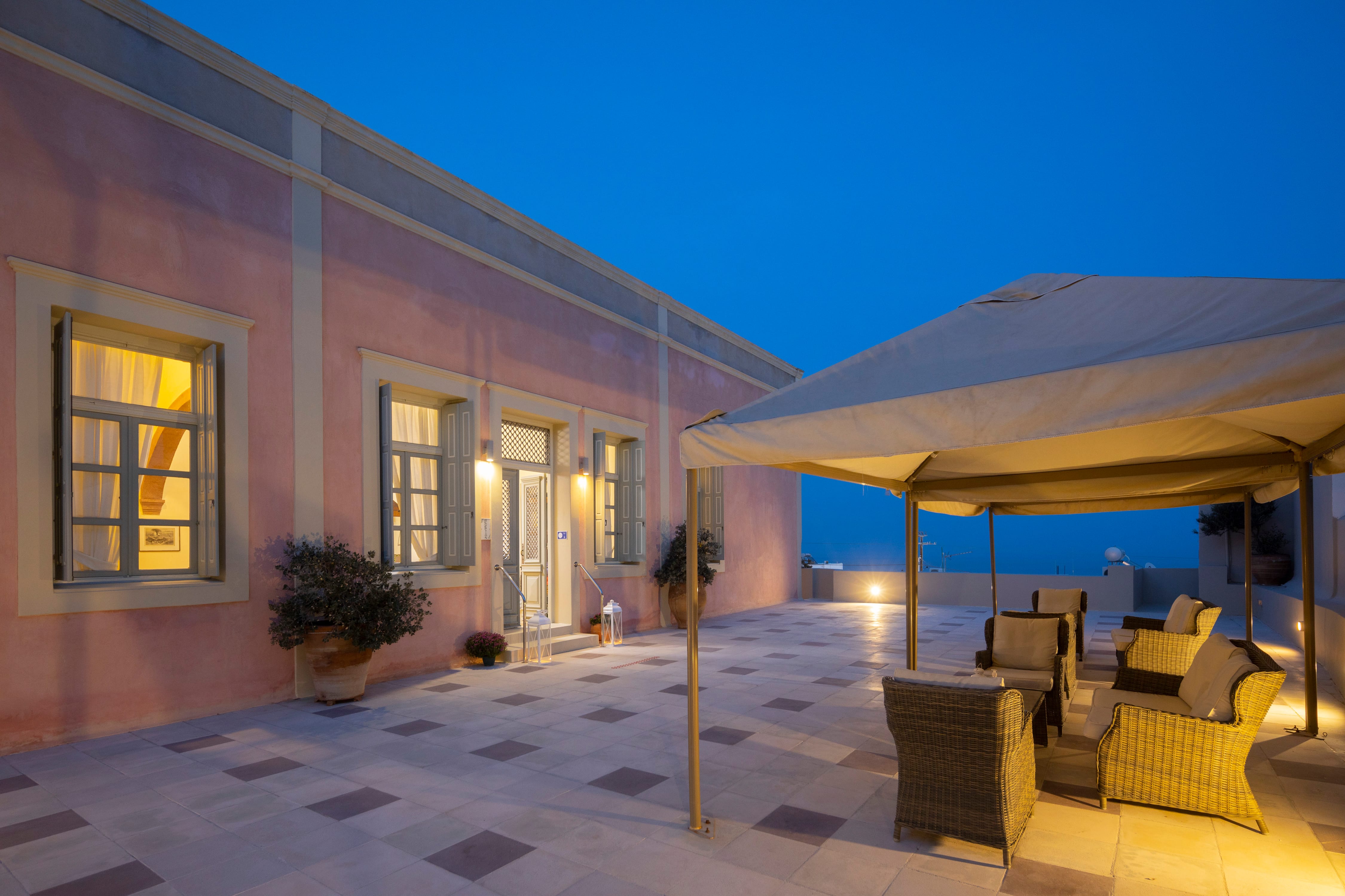 a building with a patio and a covered patio