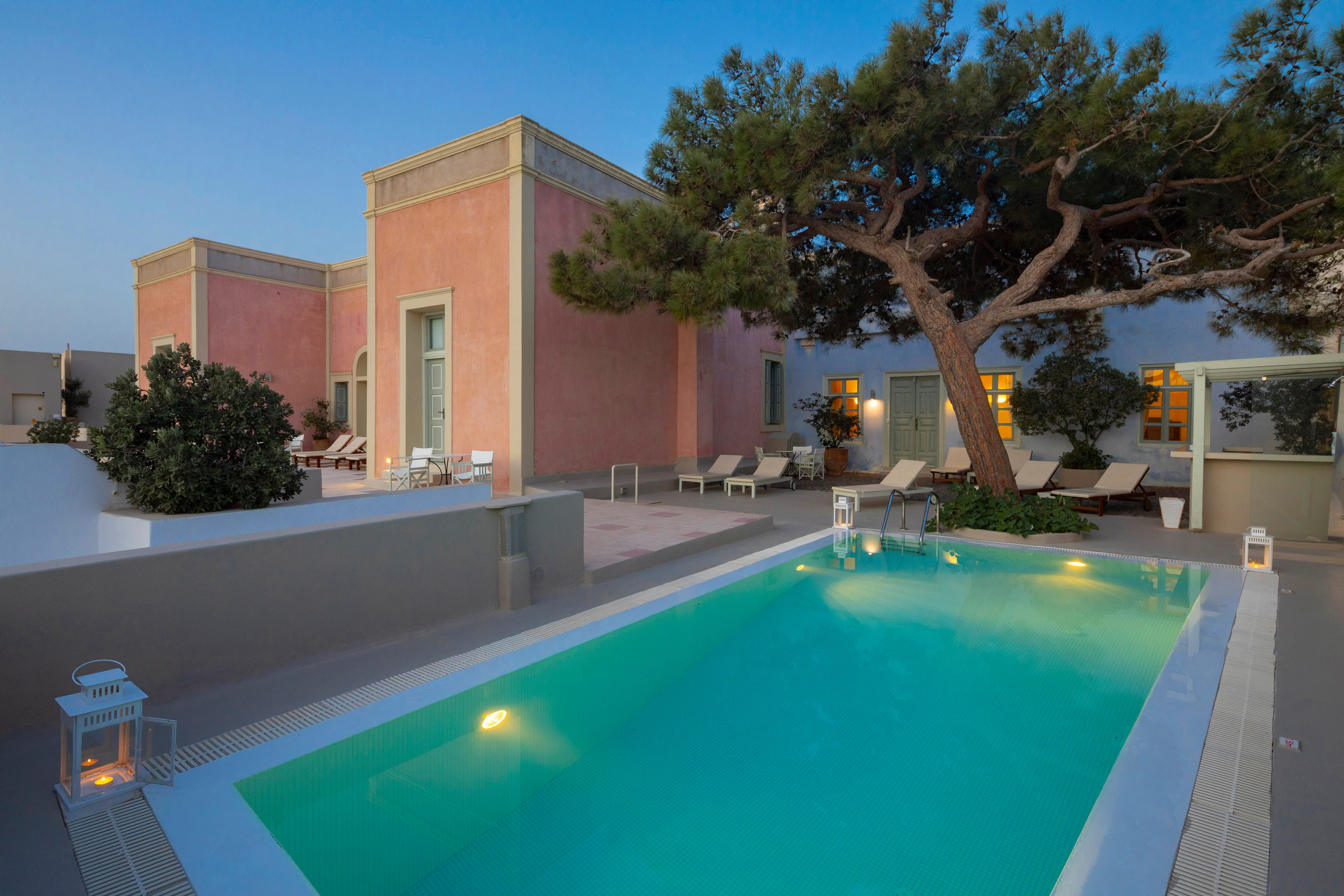 a pool in front of a house