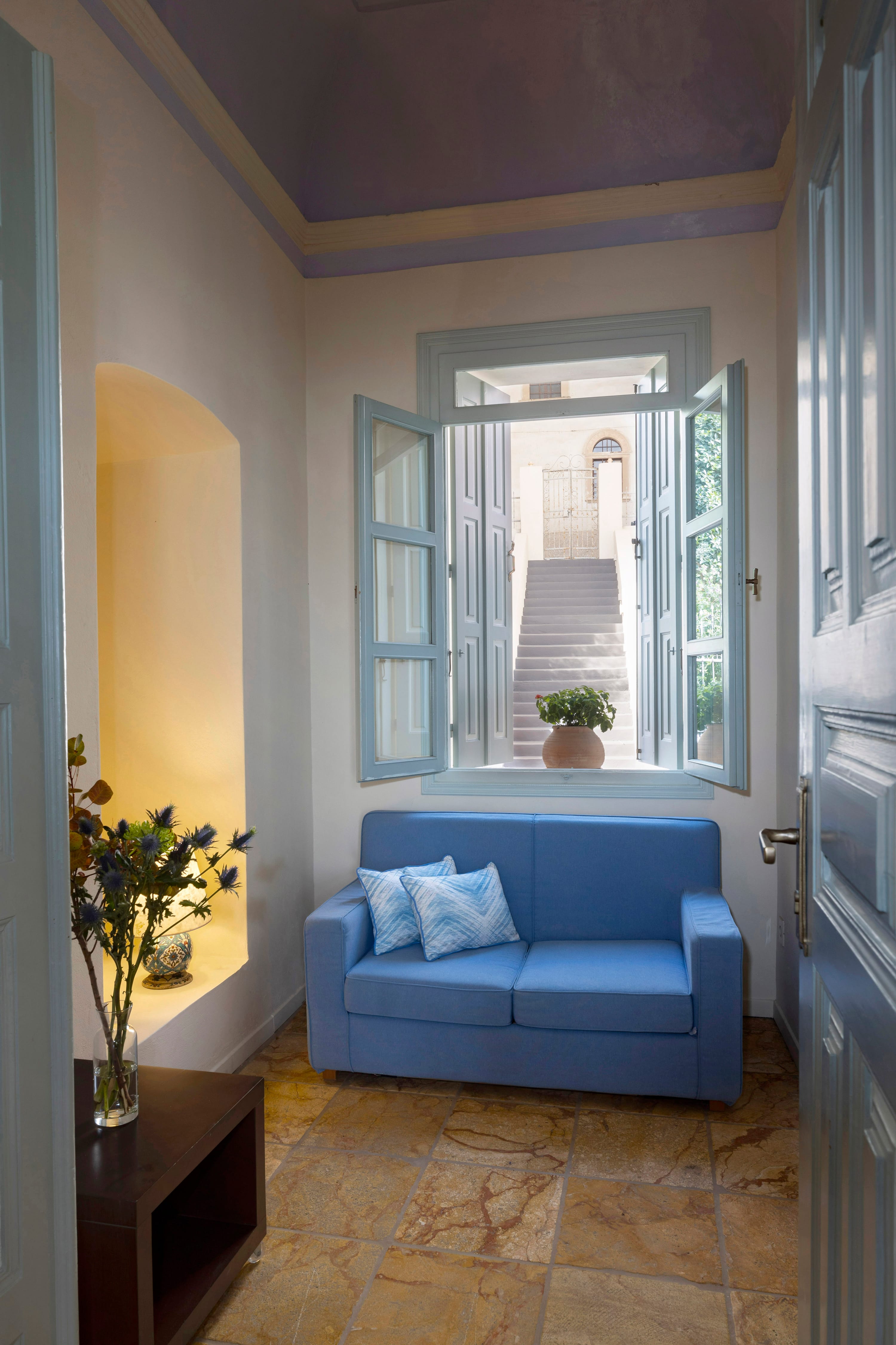 a blue couch in a room