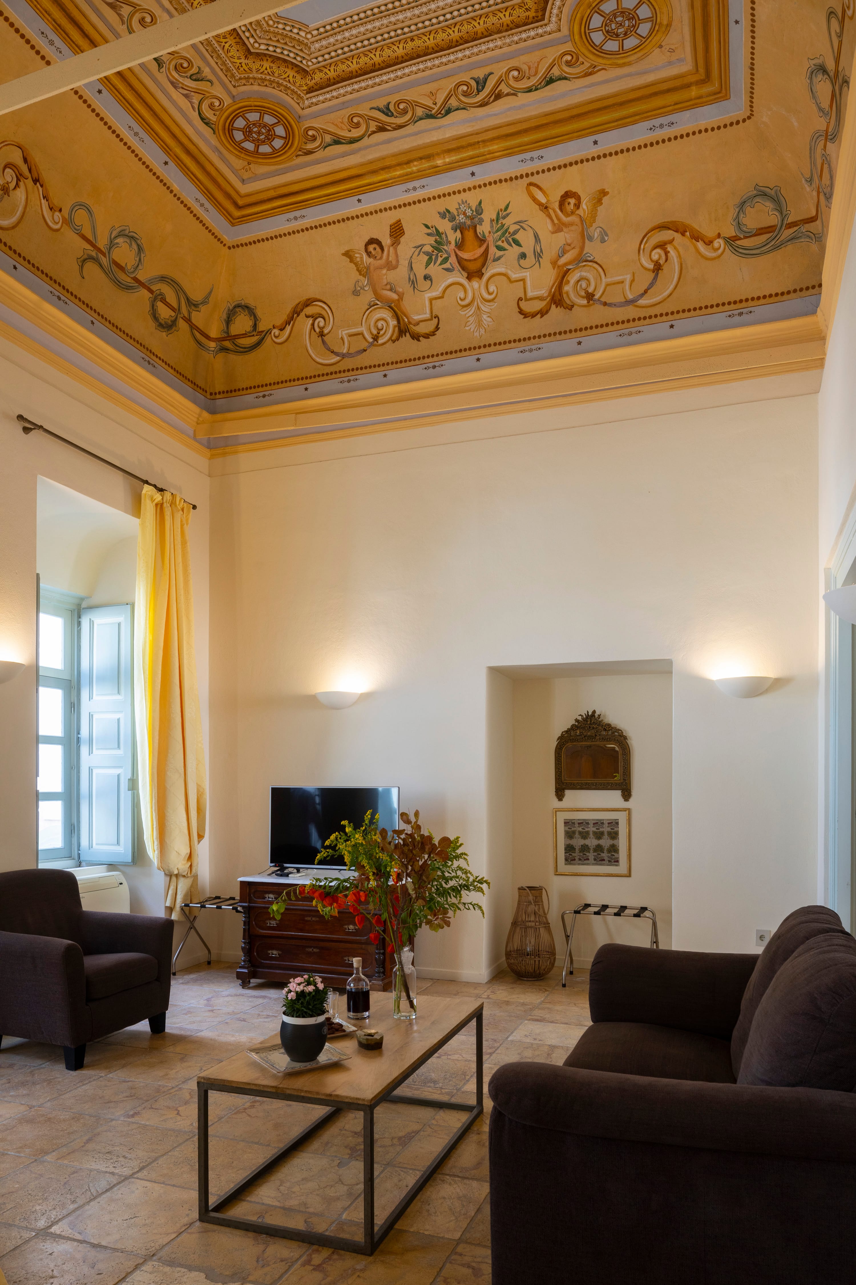 a living room with a large ceiling
