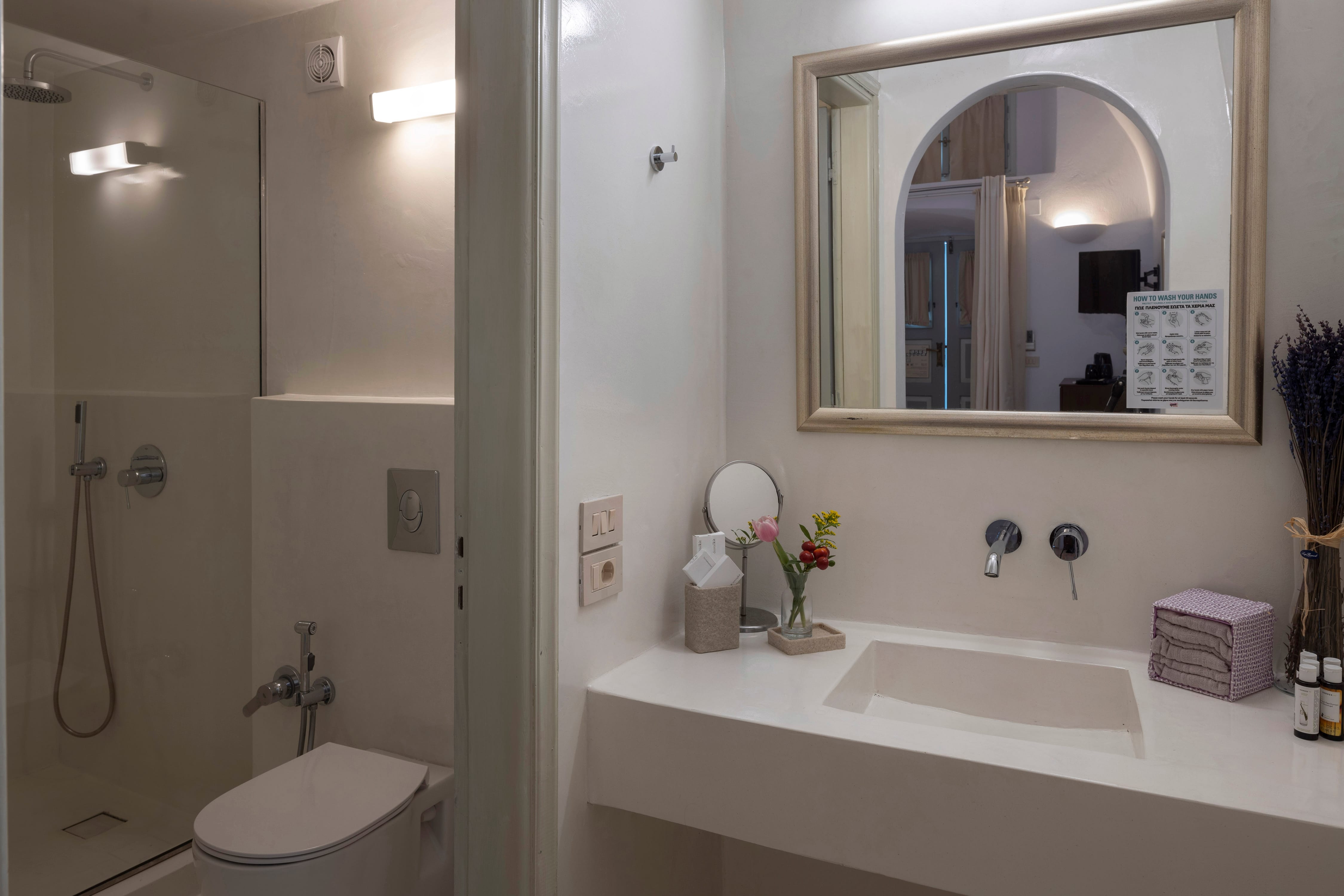 a bathroom with a large mirror