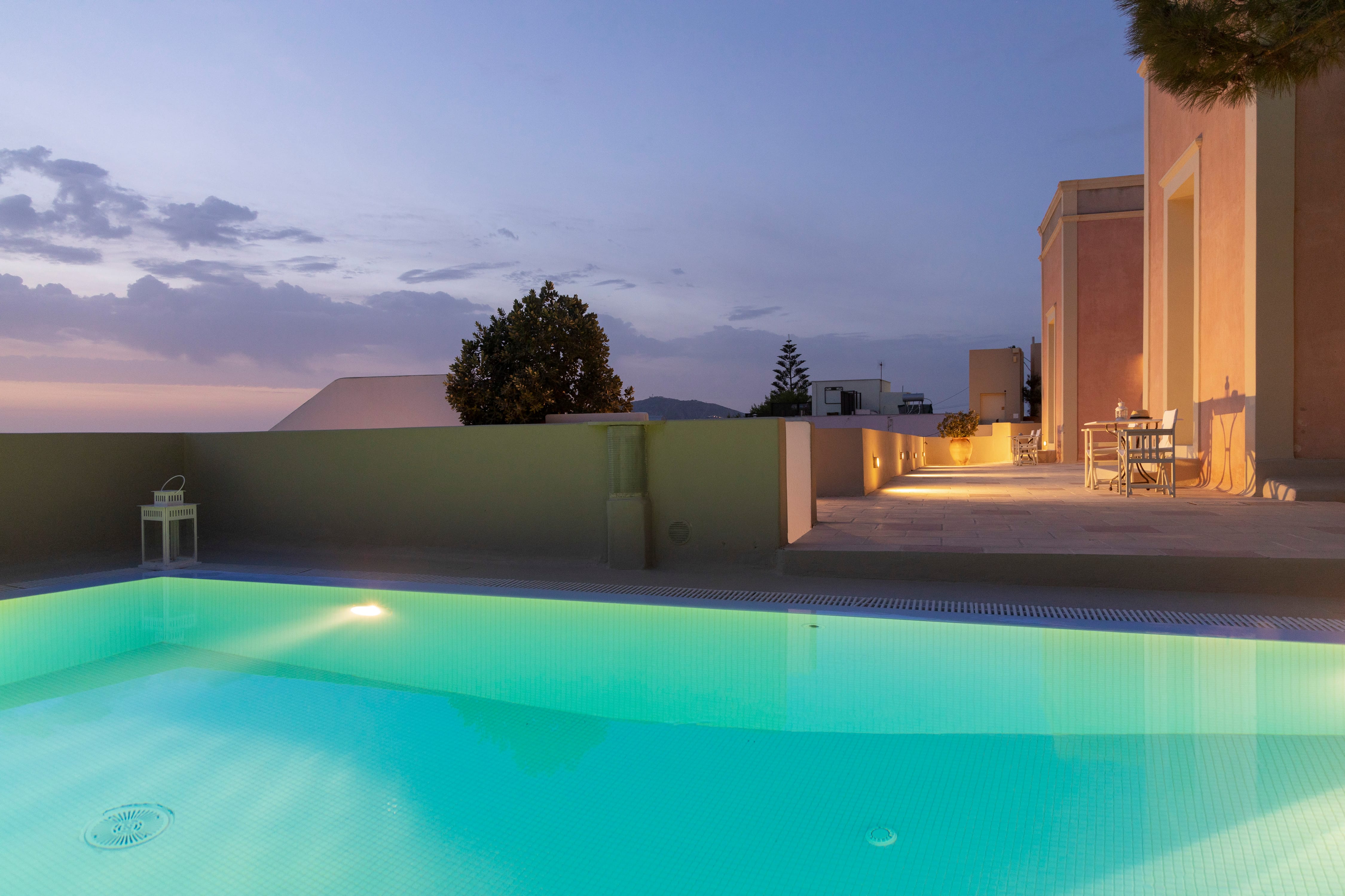 a pool with a building in the background