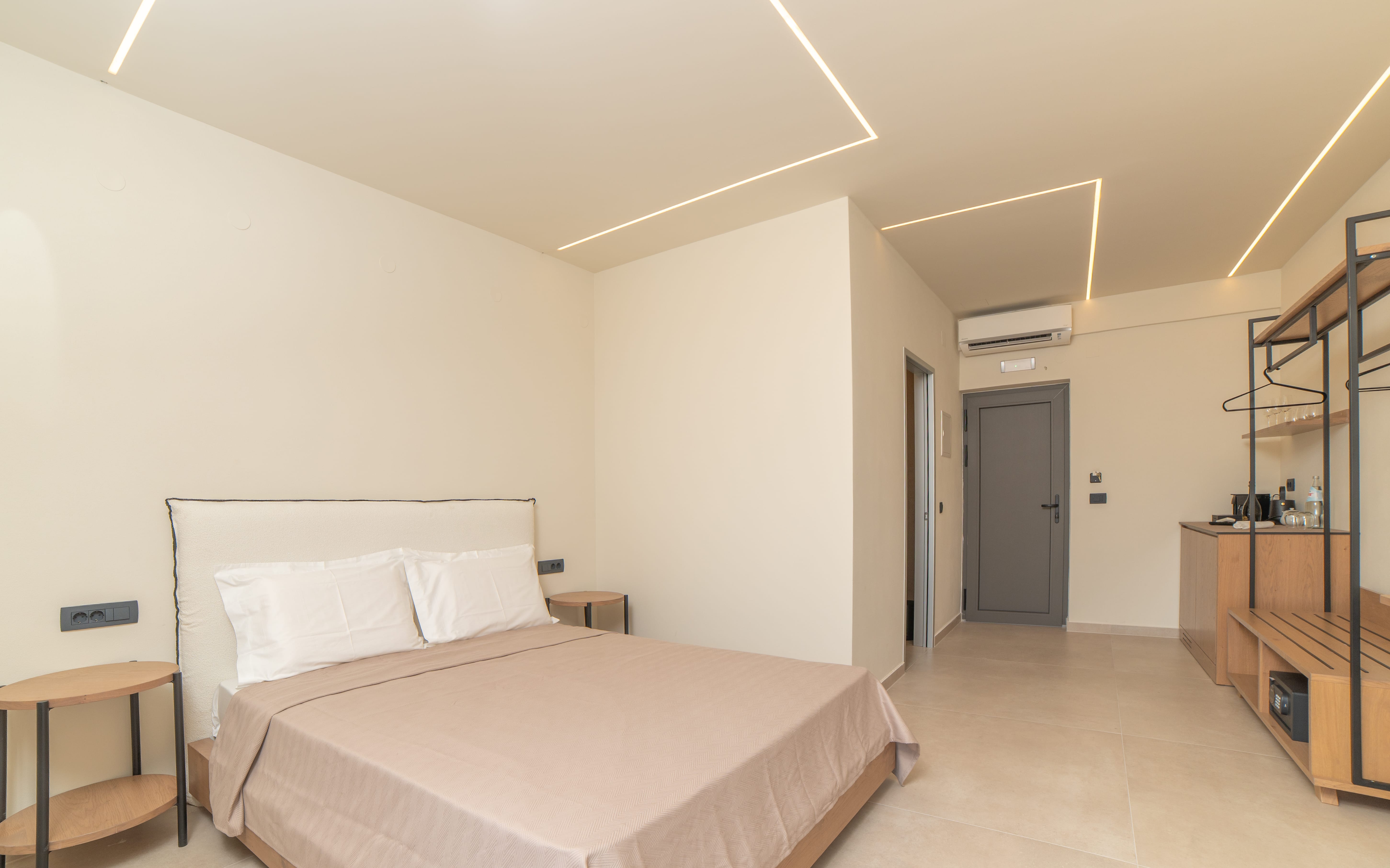 a room with a bed and a desk