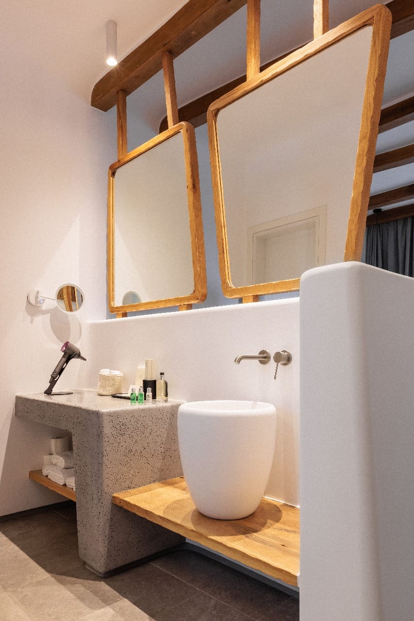 a bathroom with a large mirror