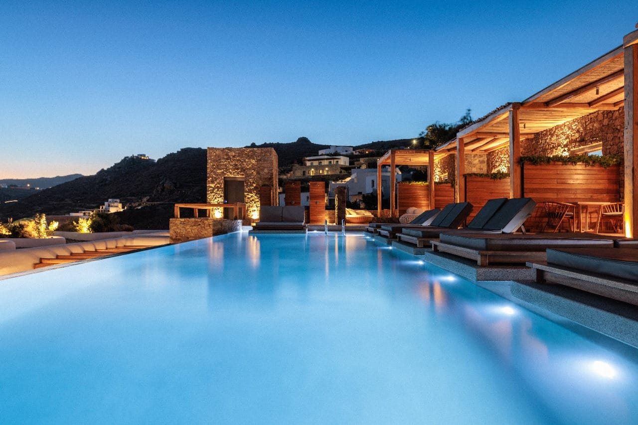 a pool with a building in the background