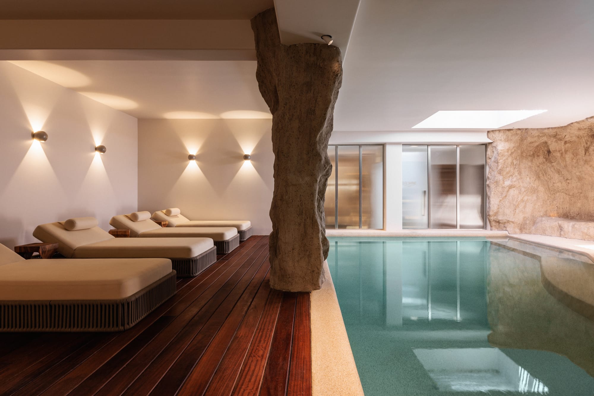 a large living room with a pool