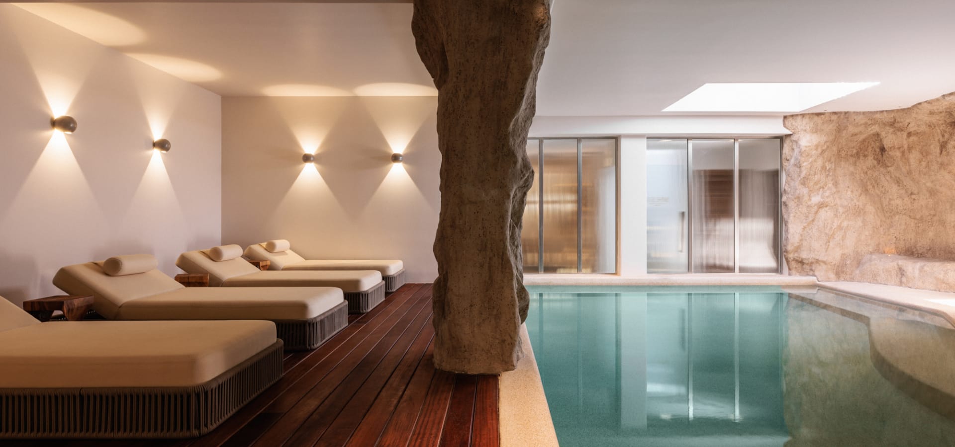 a large living room with a pool