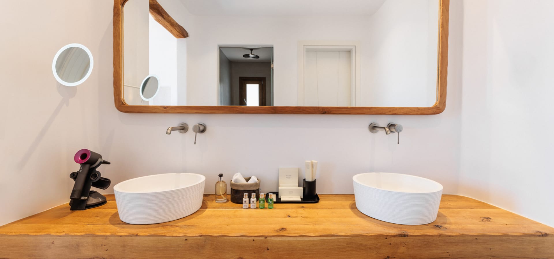 a bathroom with a large mirror