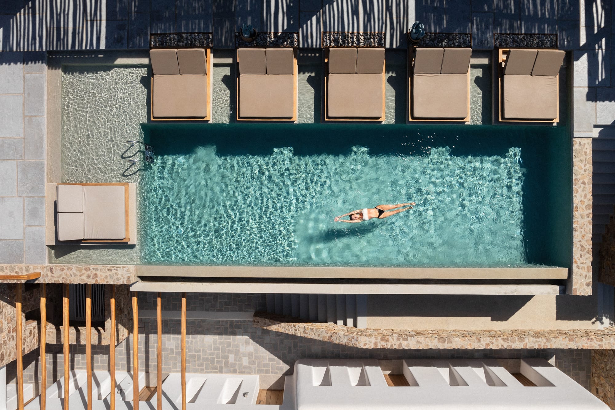 a person swimming in a pool