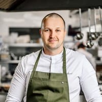 a man wearing a vest