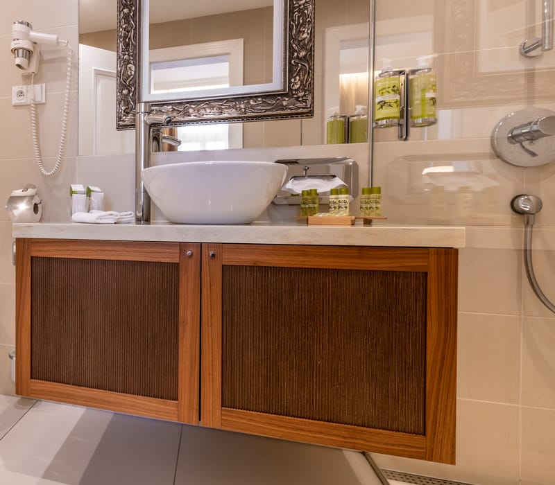 a bathroom with a sink and a mirror