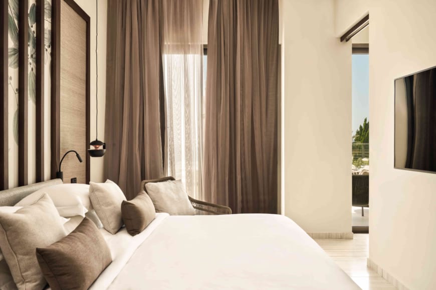 a bed with brown curtains