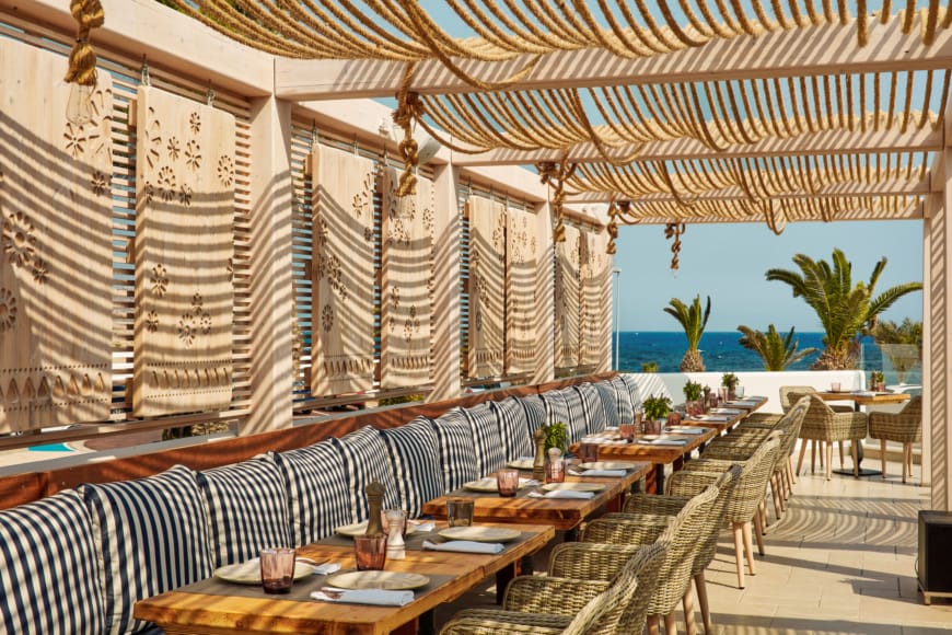 a restaurant with tables and chairs
