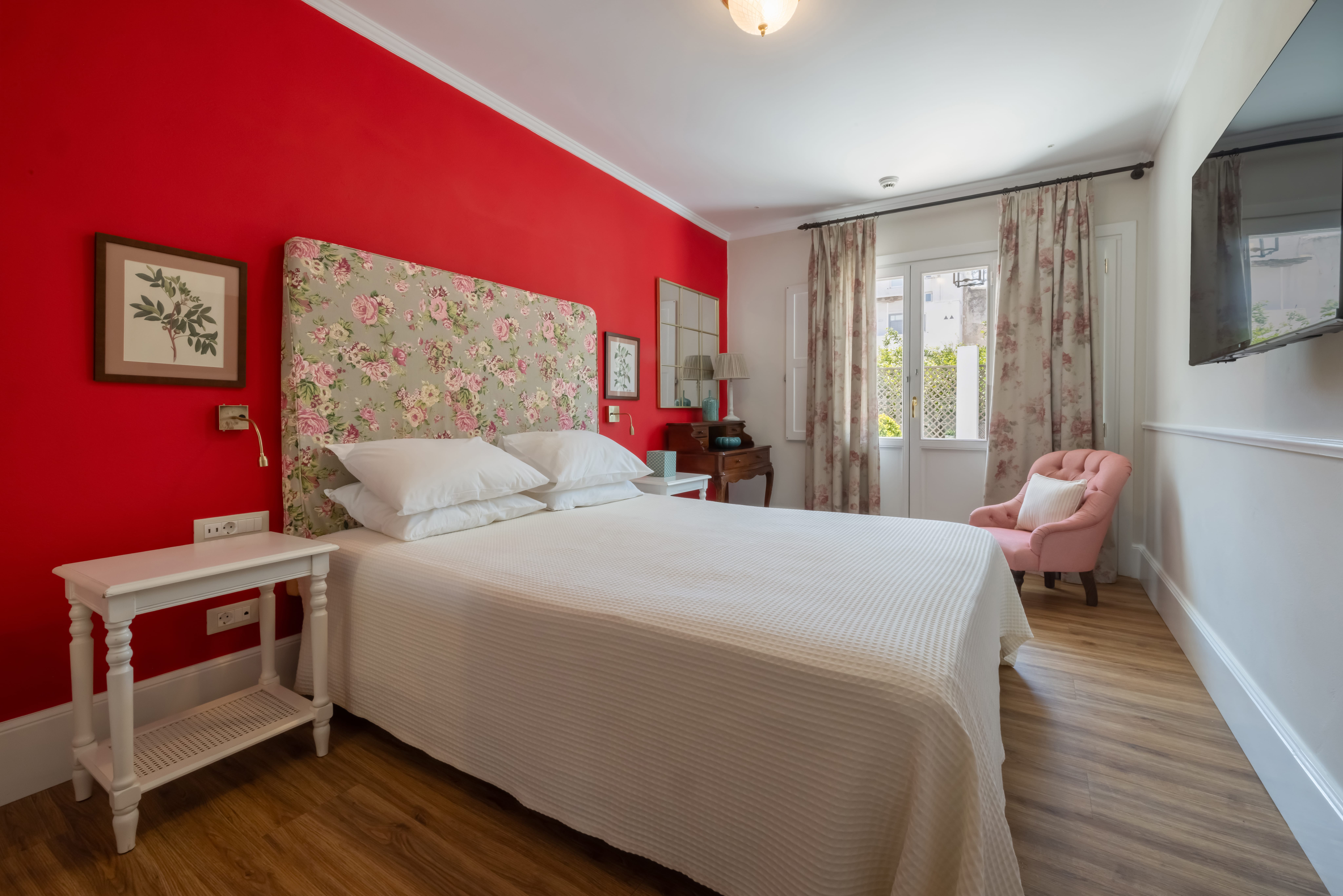 a bedroom with a bed and a chair