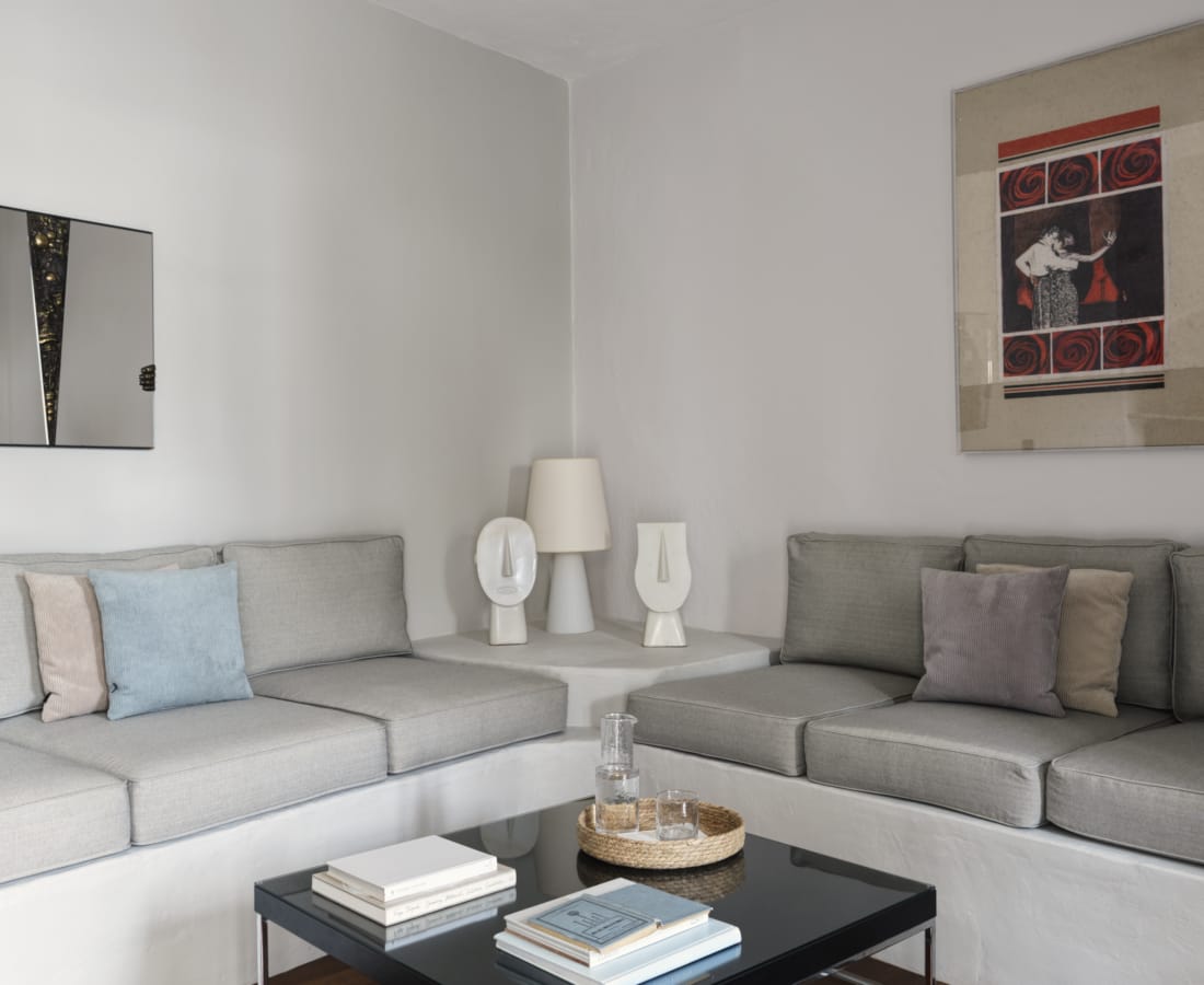 a living room with a couch and coffee table