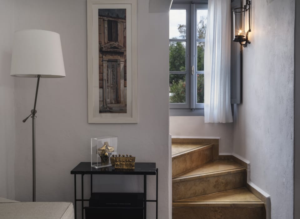 a room with a table and a lamp