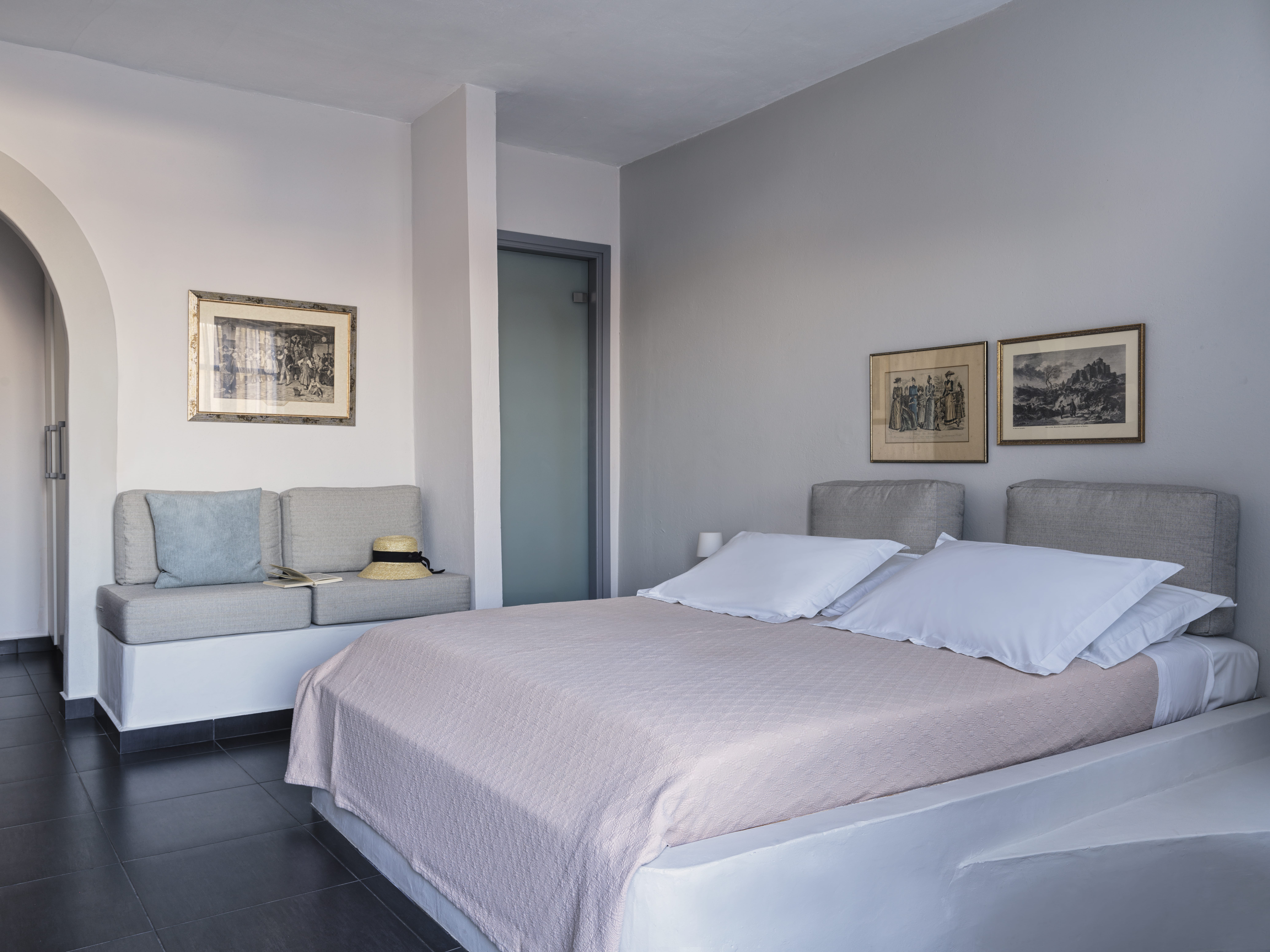 a bedroom with a large window