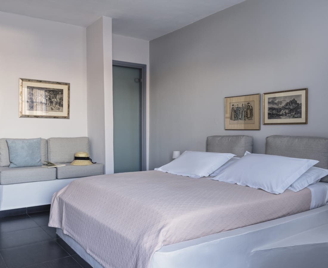 a bedroom with a large window