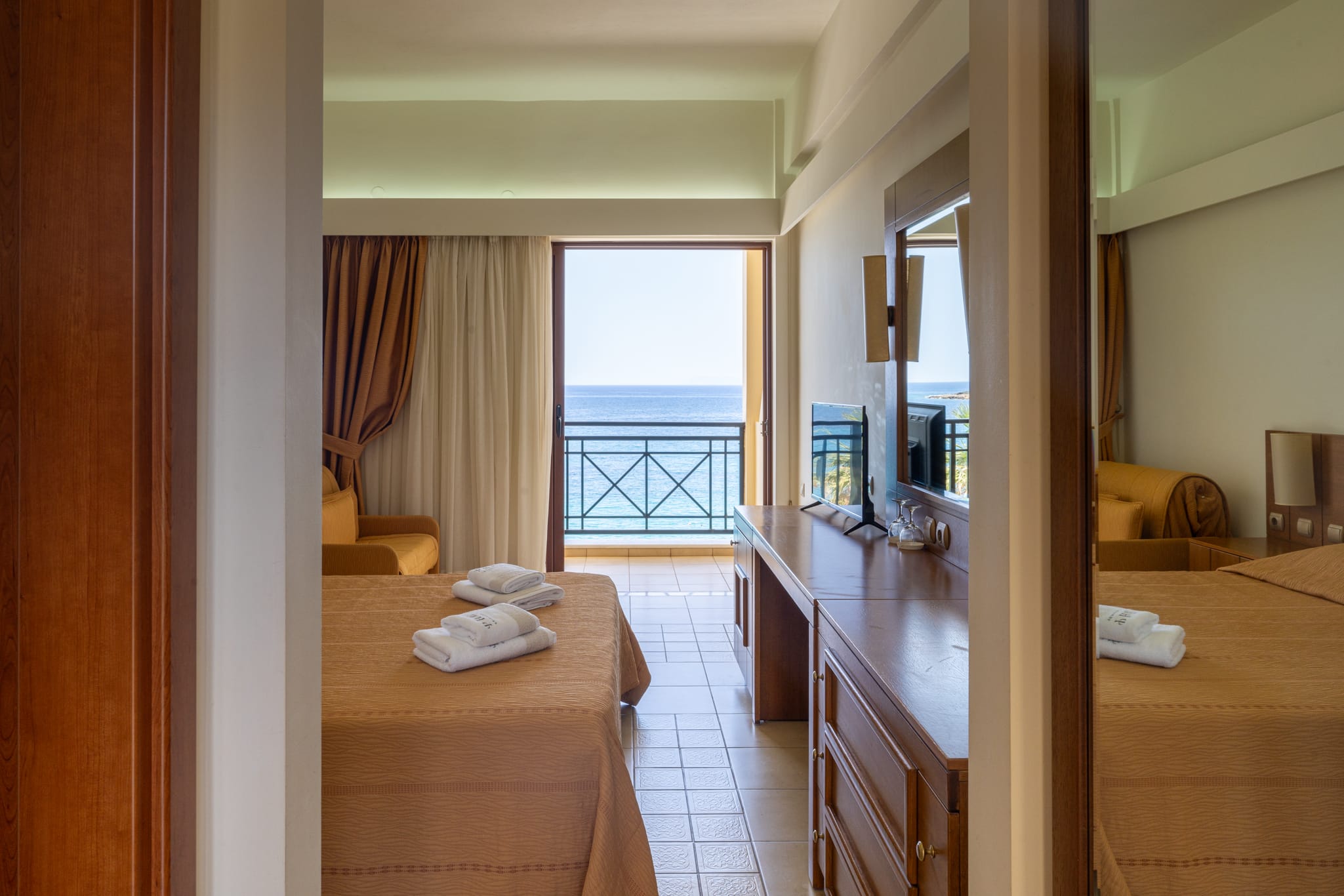 a room with a television and a bed