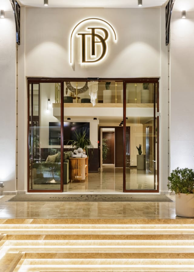 a building with a glass front entrance