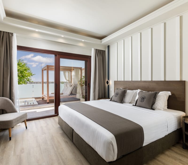 a bedroom with a large window