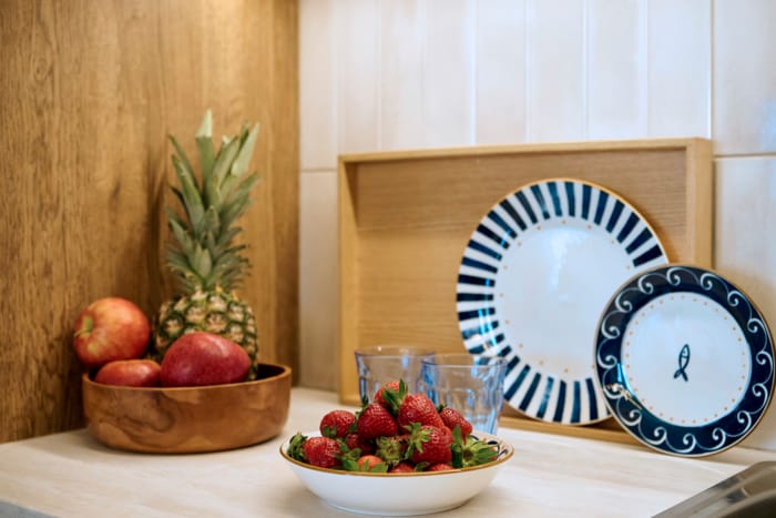 a bowl of fruit on a table