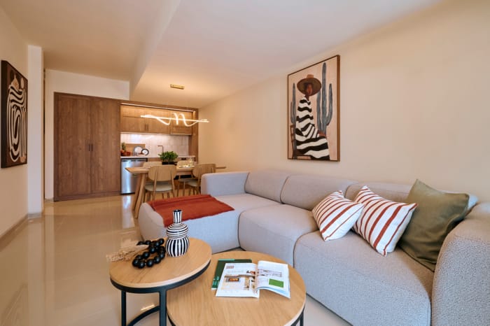 a living room with a couch and a table