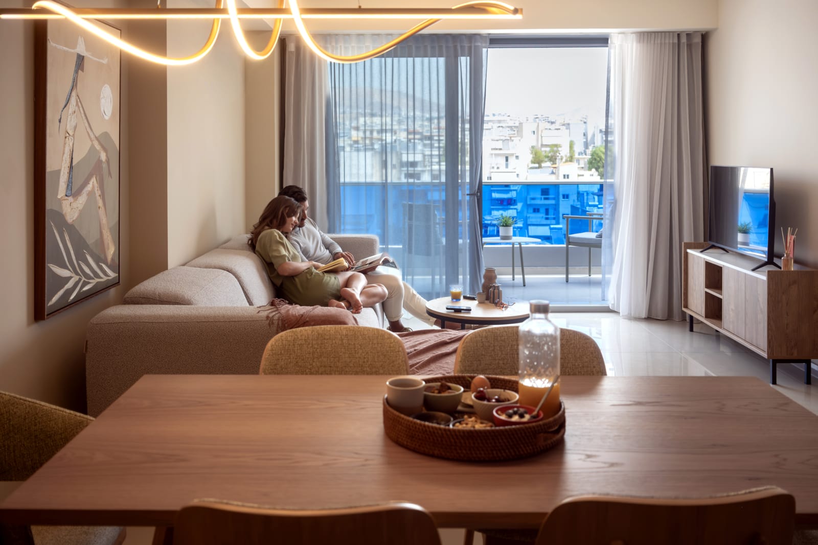 a person and person sitting on a couch