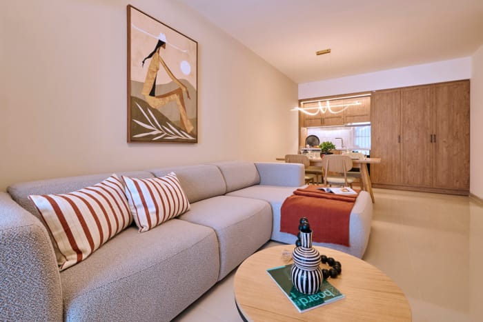 a living room with a couch and a table