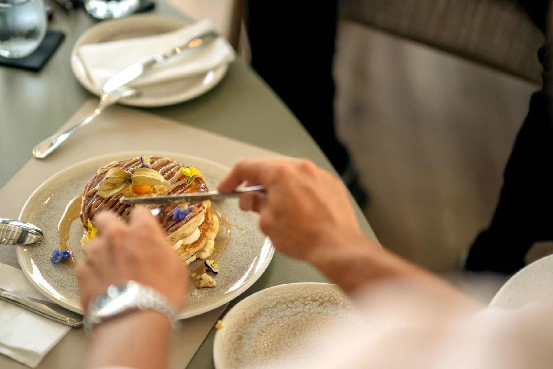 a person eating a pancake