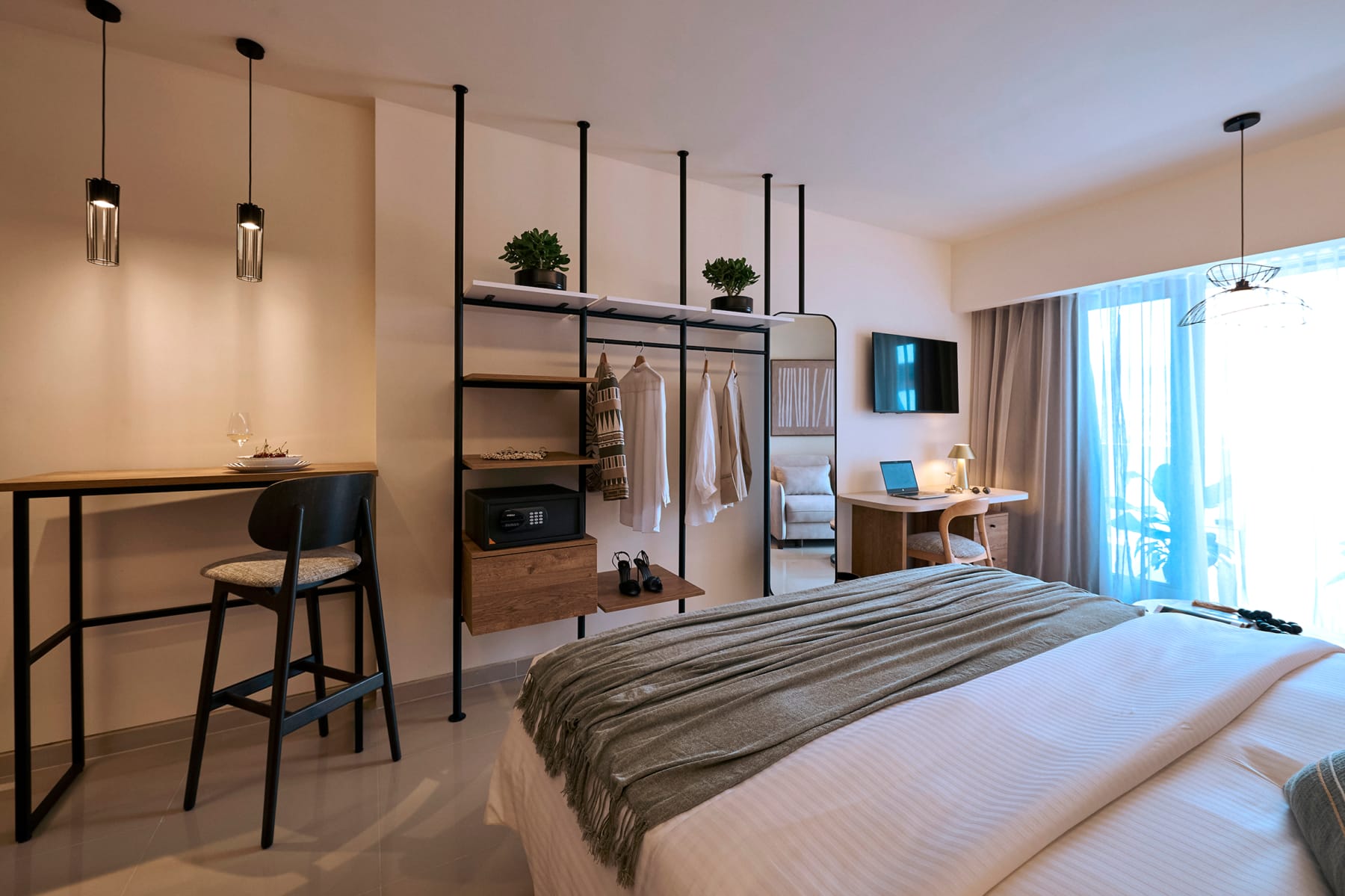 a room with a bed and a desk