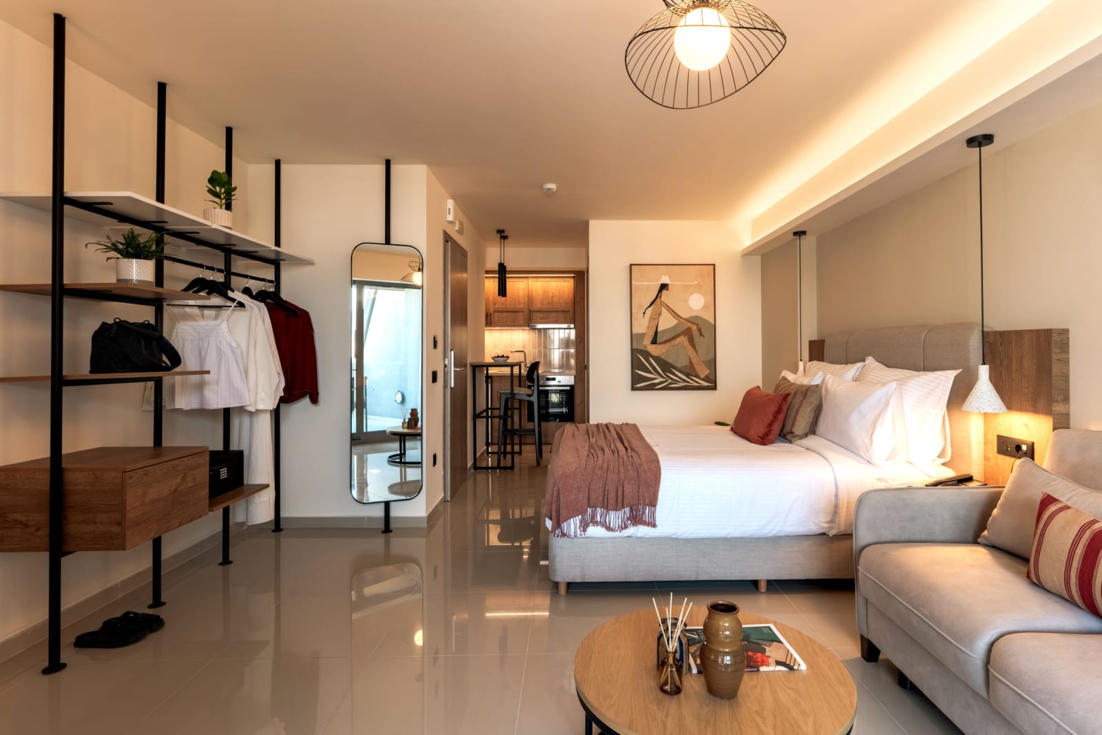 a bedroom with a bed and a couch