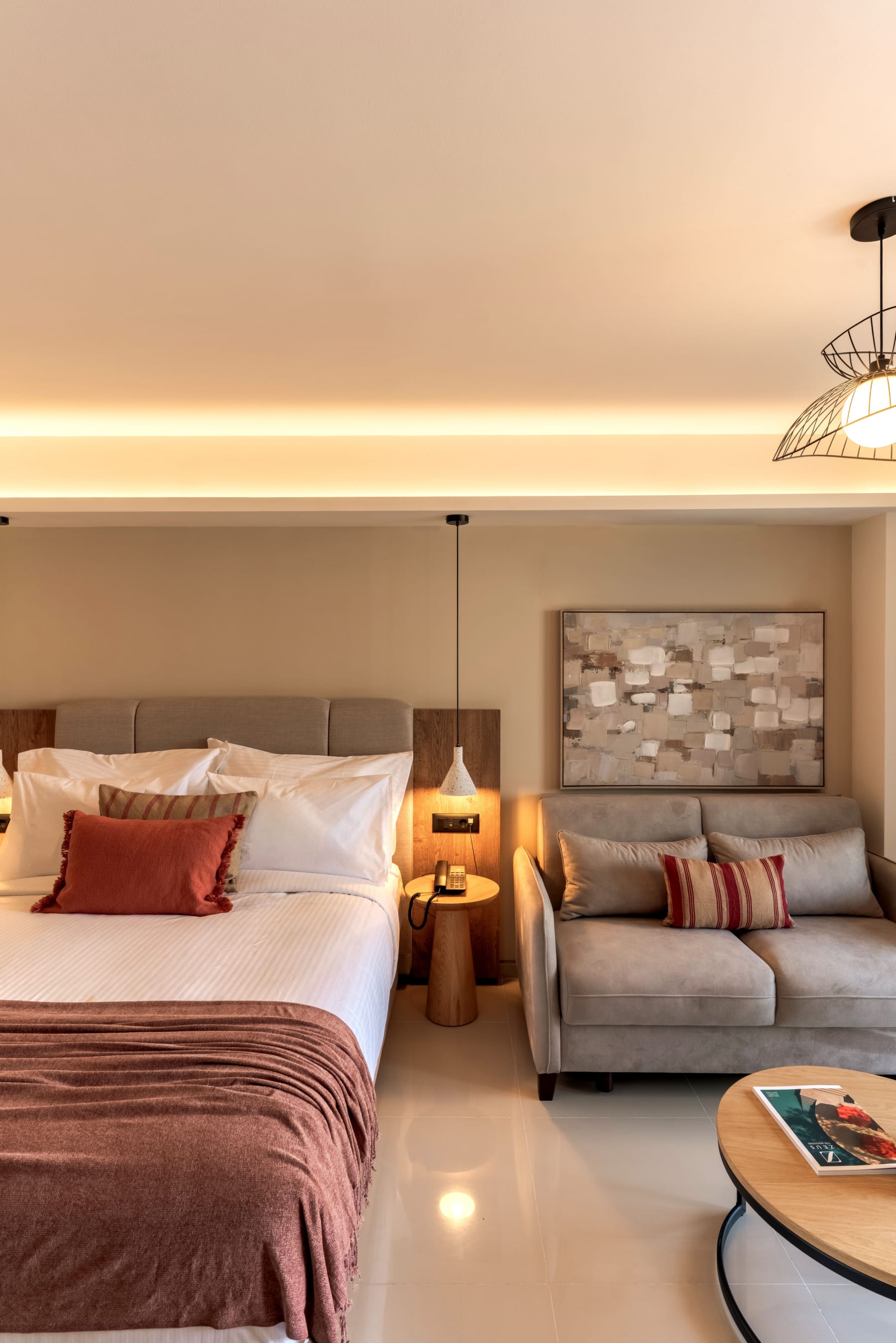 a bedroom with a bed and couch