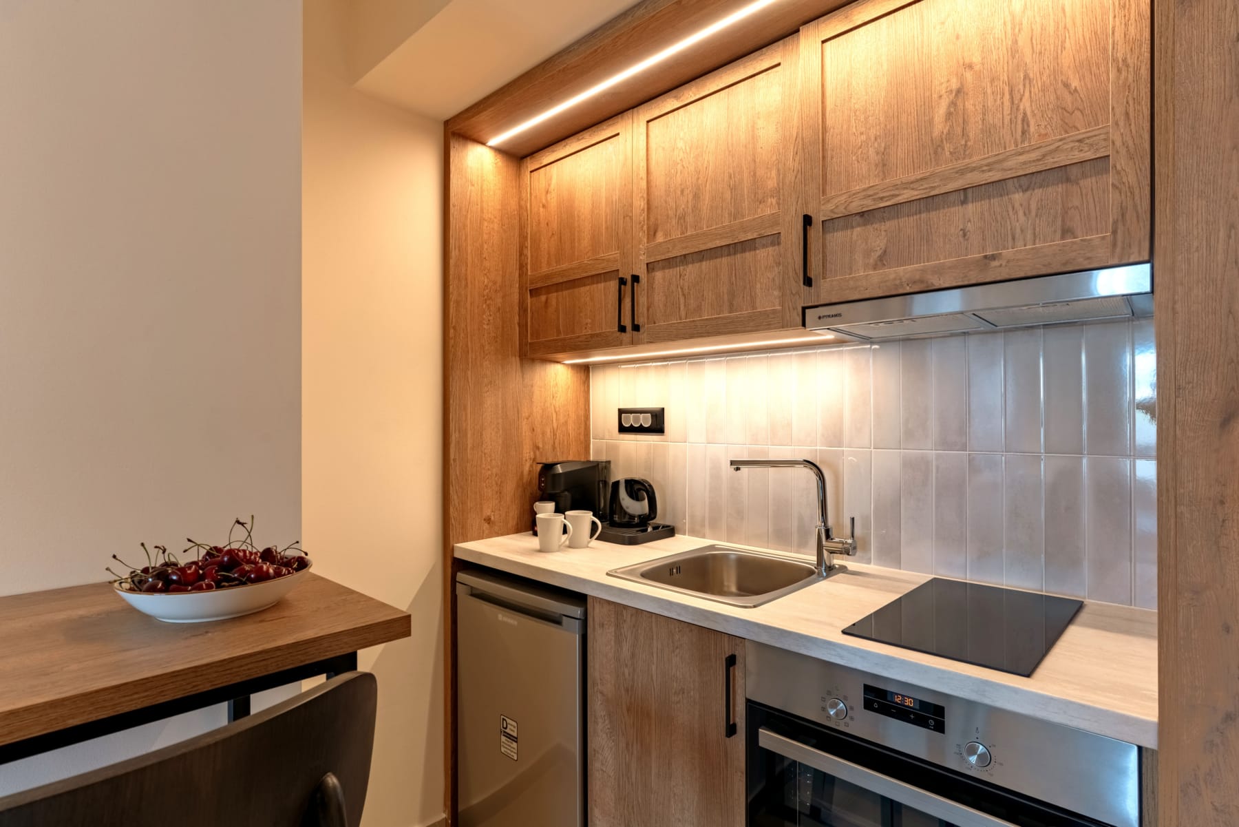 a kitchen with a sink and a dishwasher